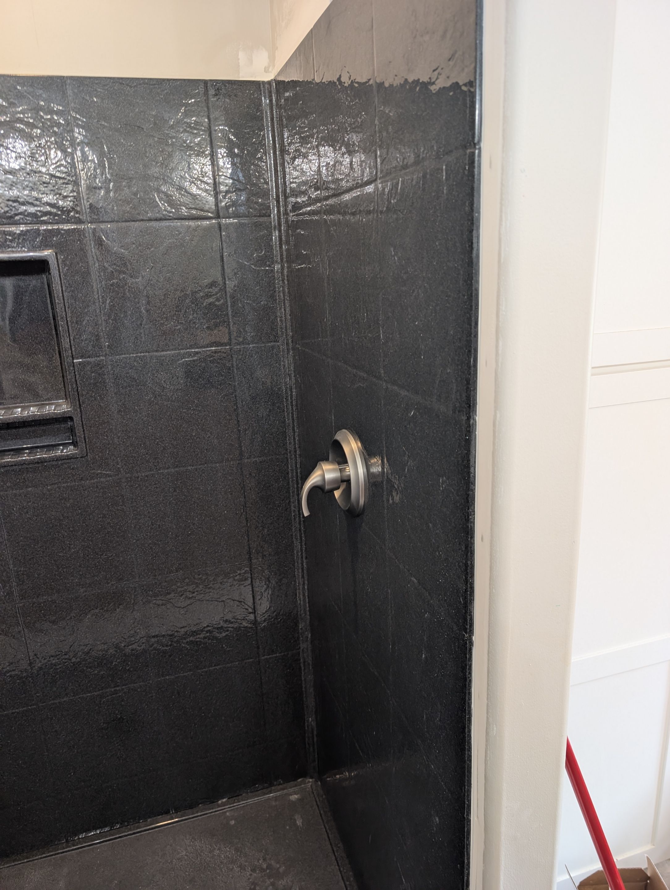 Master Bathroom Renovation Featuring Dark Textured Shower Panels in Branson West by Kitchen Works LLC