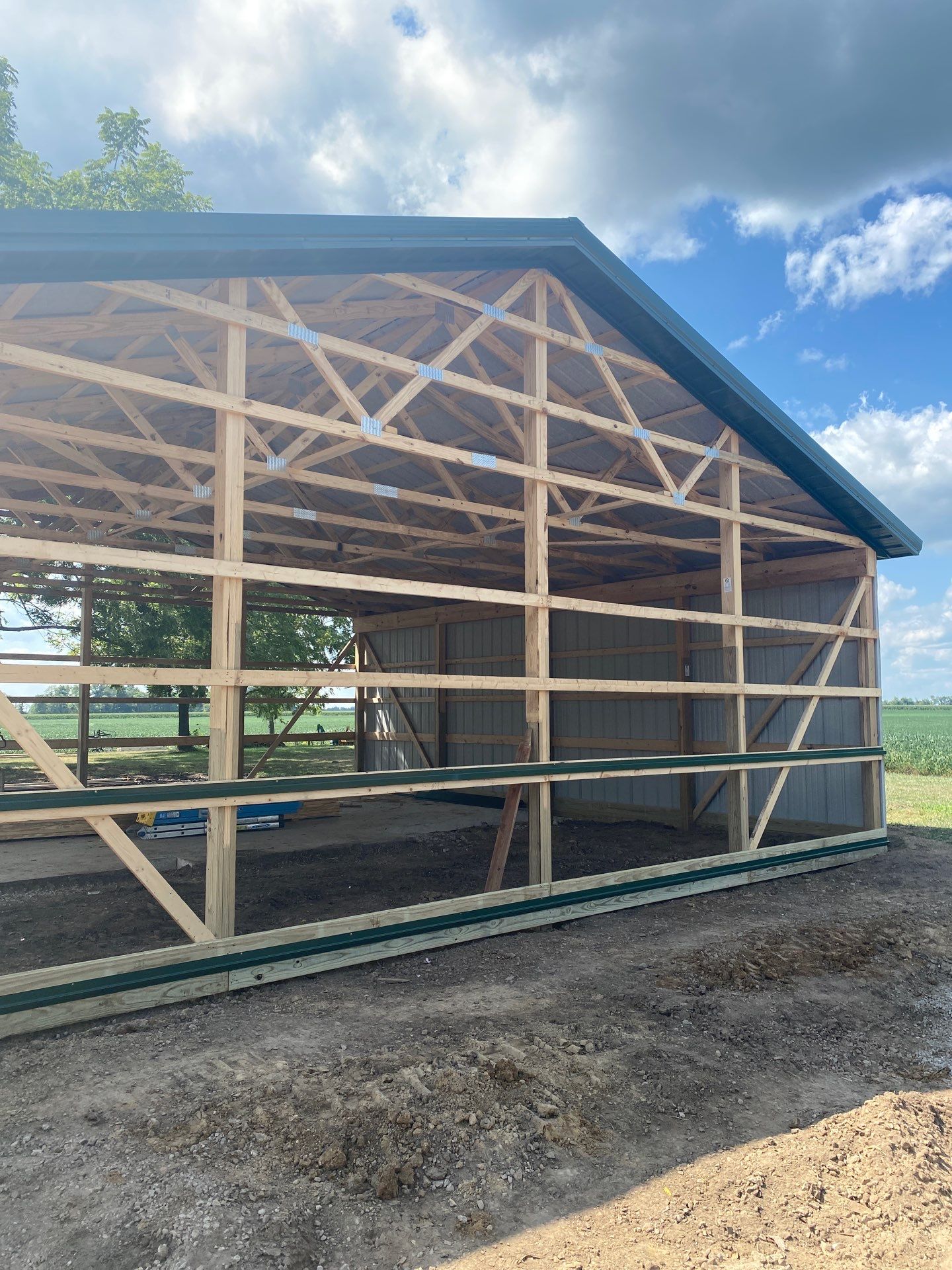 Multi-Bay Custom Pole Barn Construction in Arlington, Indiana by The Barn Builders 