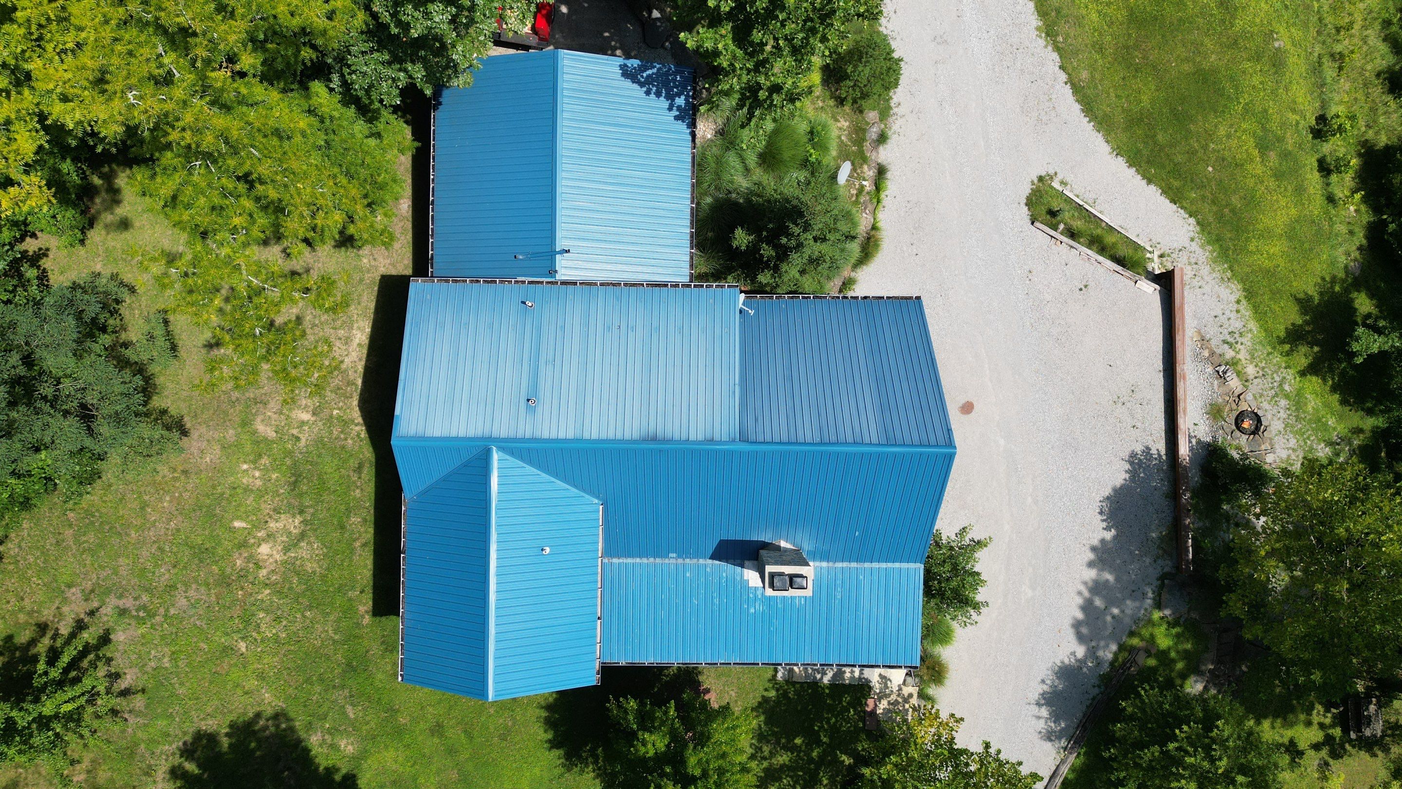 Residential Roofing Installation using Standing Seam Metal - Gallery Blue by RoofX 