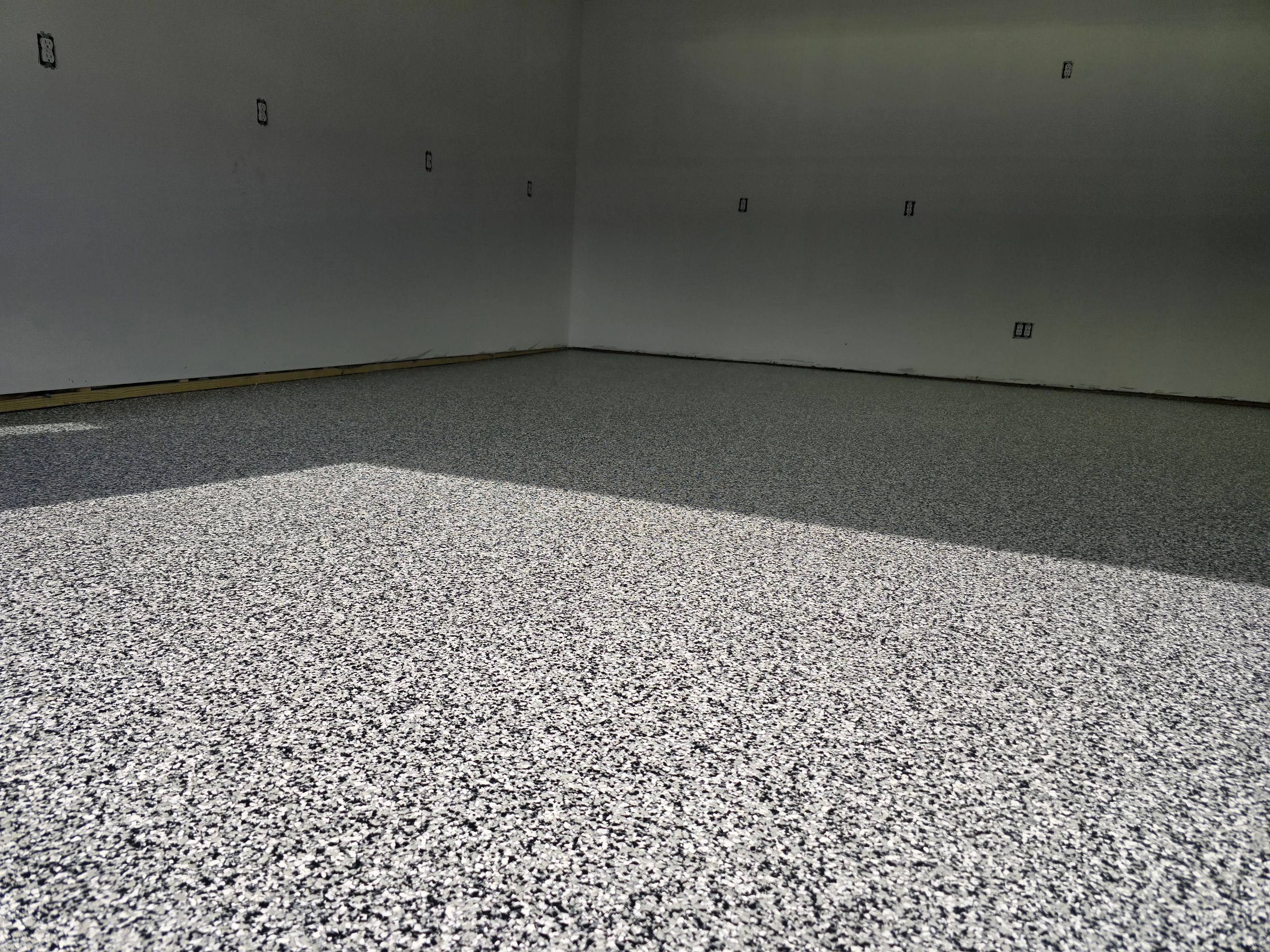 Garage using Domino by Elite Floor Solutions