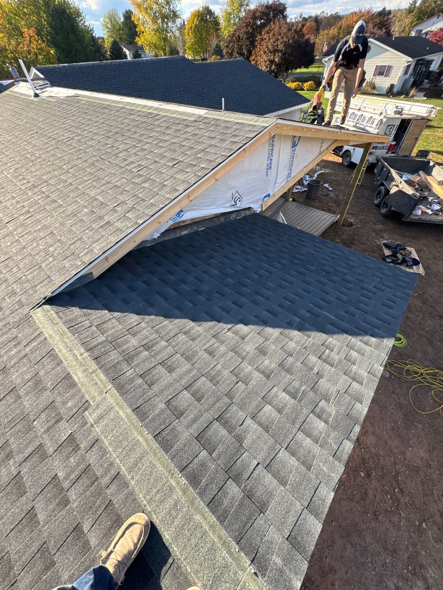 Residential Addition and Covered Porch Roof  by Esh Builders