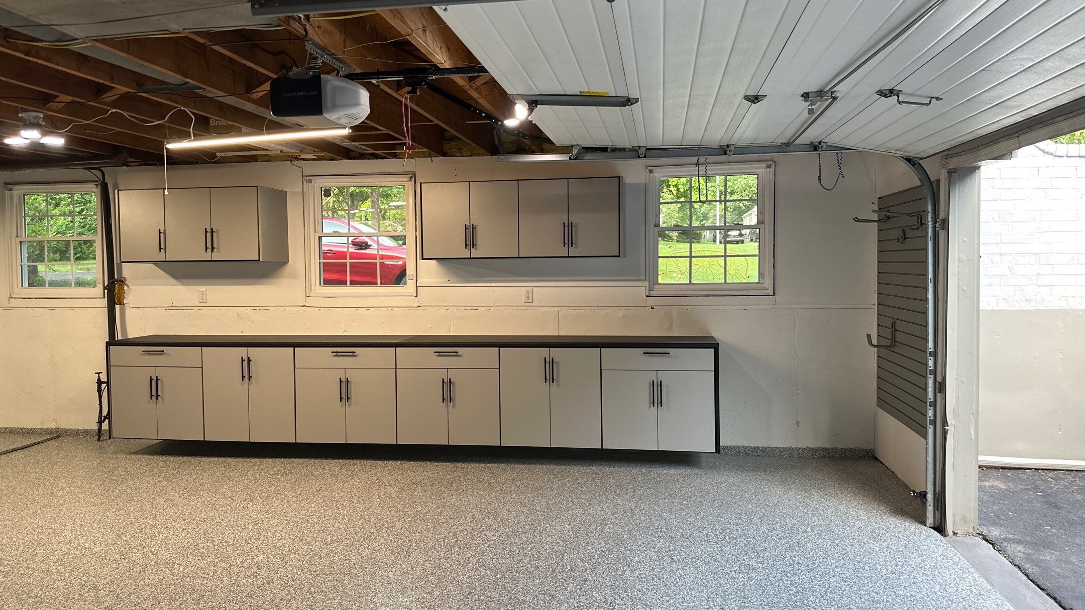 Vernon T. new garage floor and storage looks great!! by Banner Garage