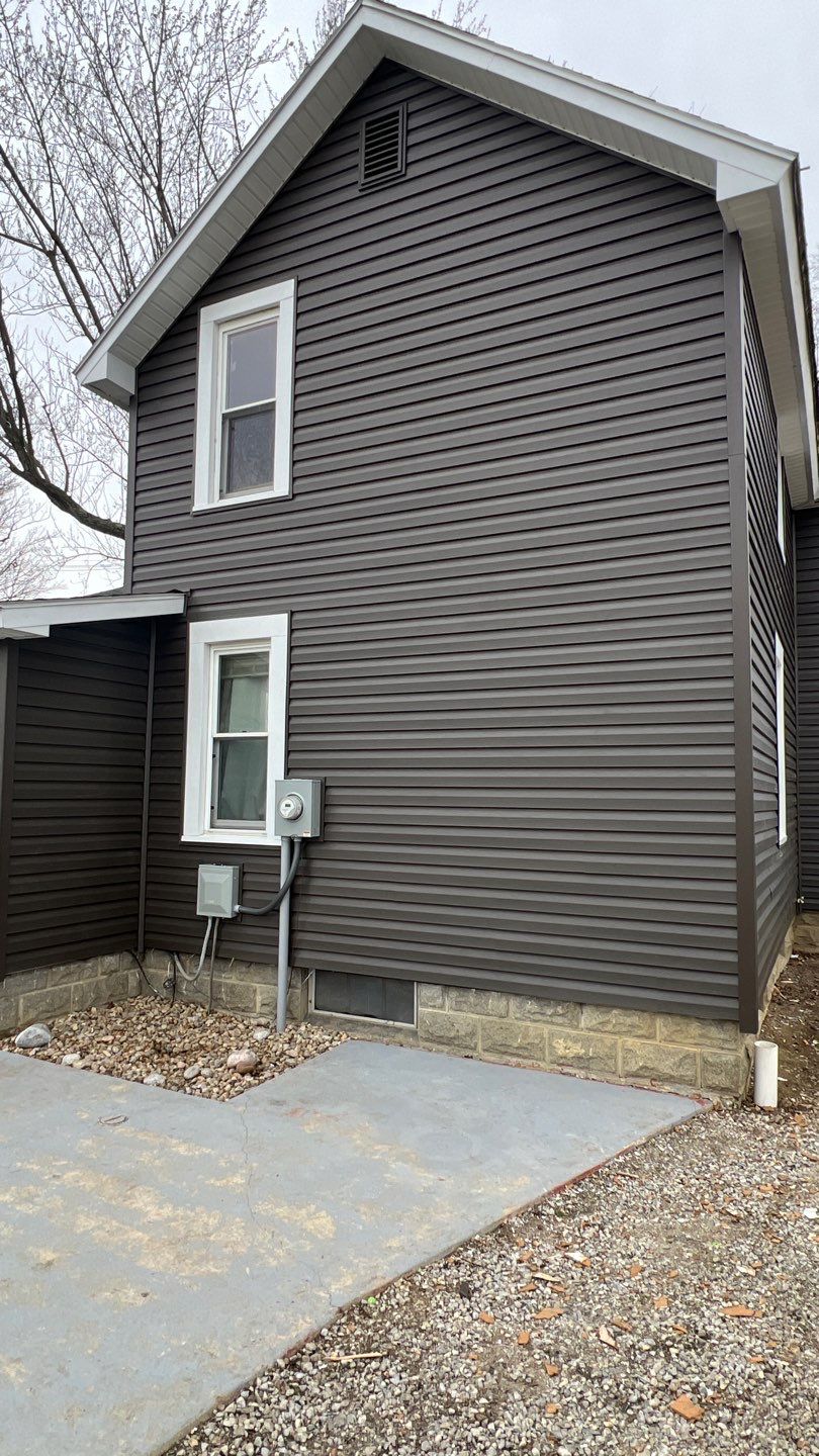 Residential fascia replacement using Exterior Portfolio 4.5 DL - Peppercorn by Nitro Roofing and Construction
