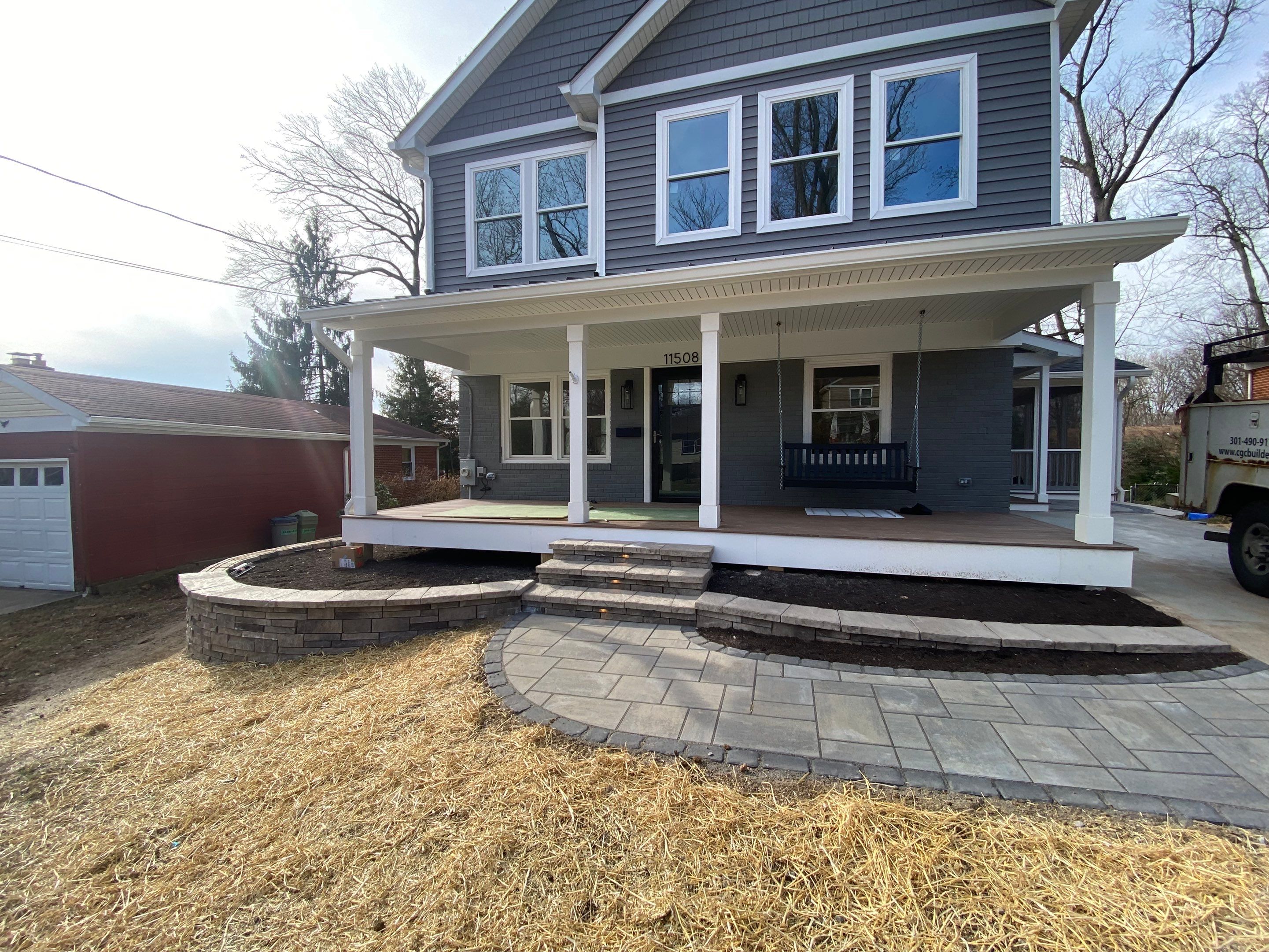 Retaining wall, walkway, small patio and landscape install by The Smet Companies, LLC