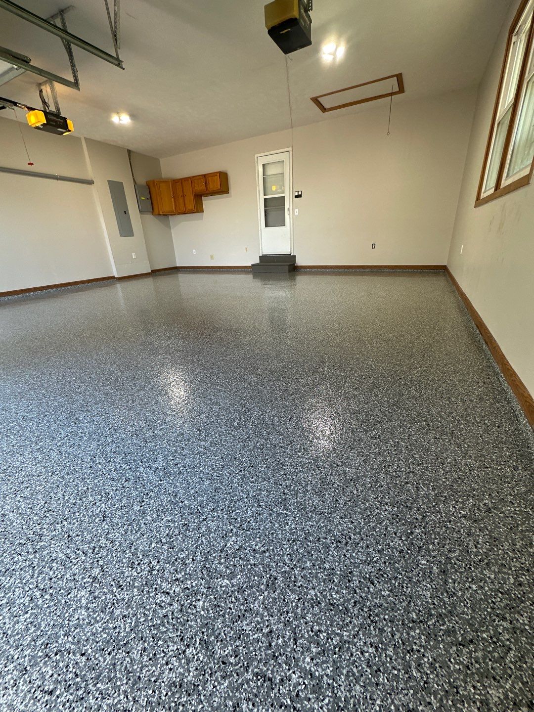 Epoxy Garage Floor Transformation and Concrete Repair in Beatrice by Goat Coatings