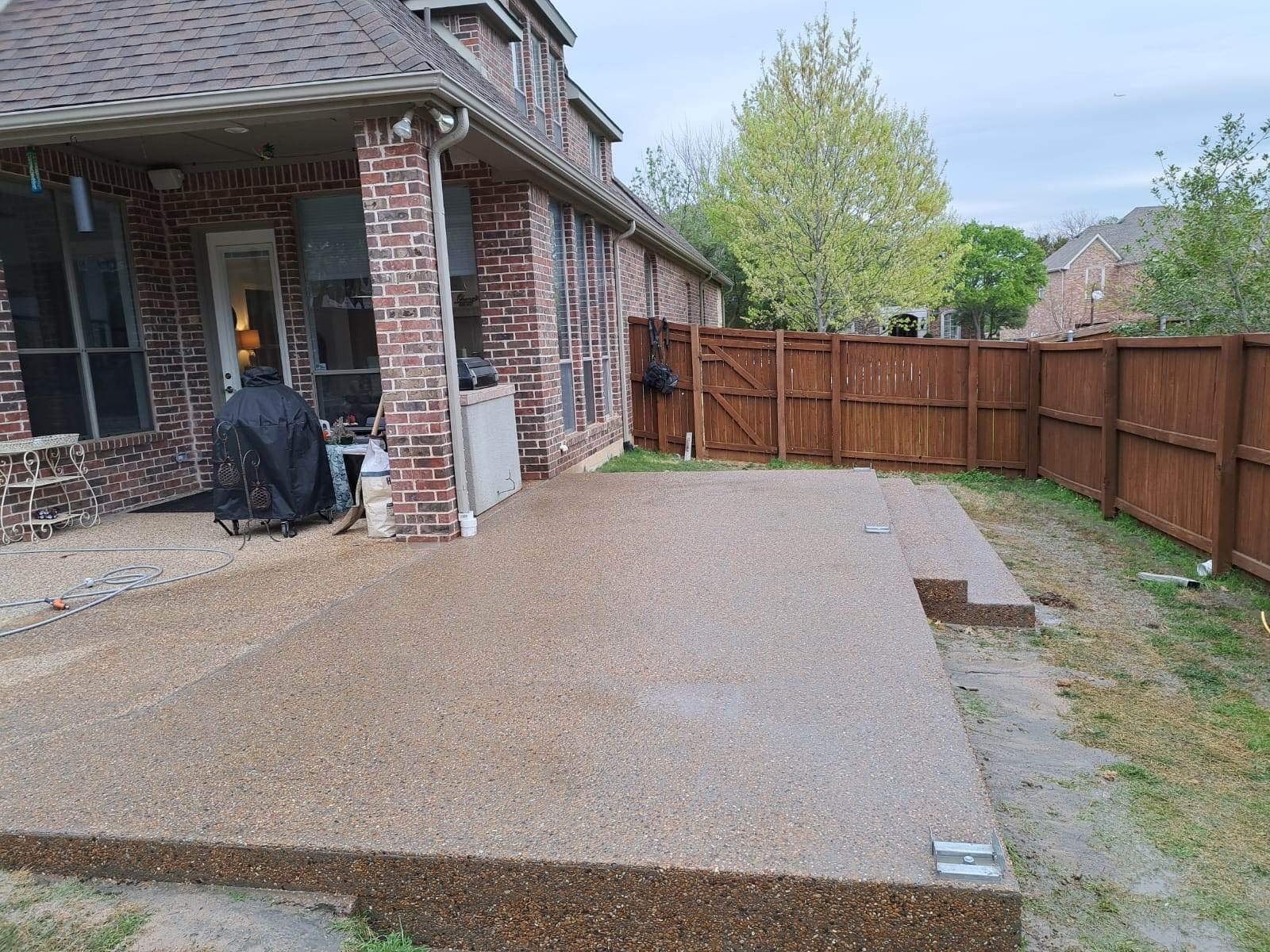 Concrete & Outdoor Living by Trophy Roofing & Construction LLC