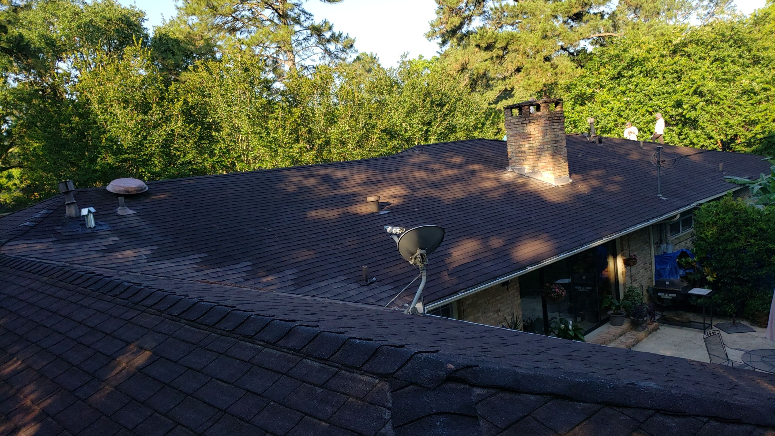 Residential Roofing Installation using Roof Replacement by American Roofing & Construction LLC