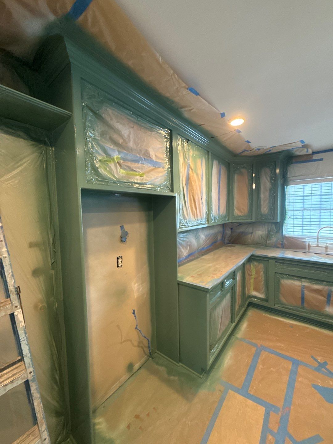 Elegant Transformation: Stained Cabinets Revamped with Sherwin-Williams Juniper by Cougar Painting