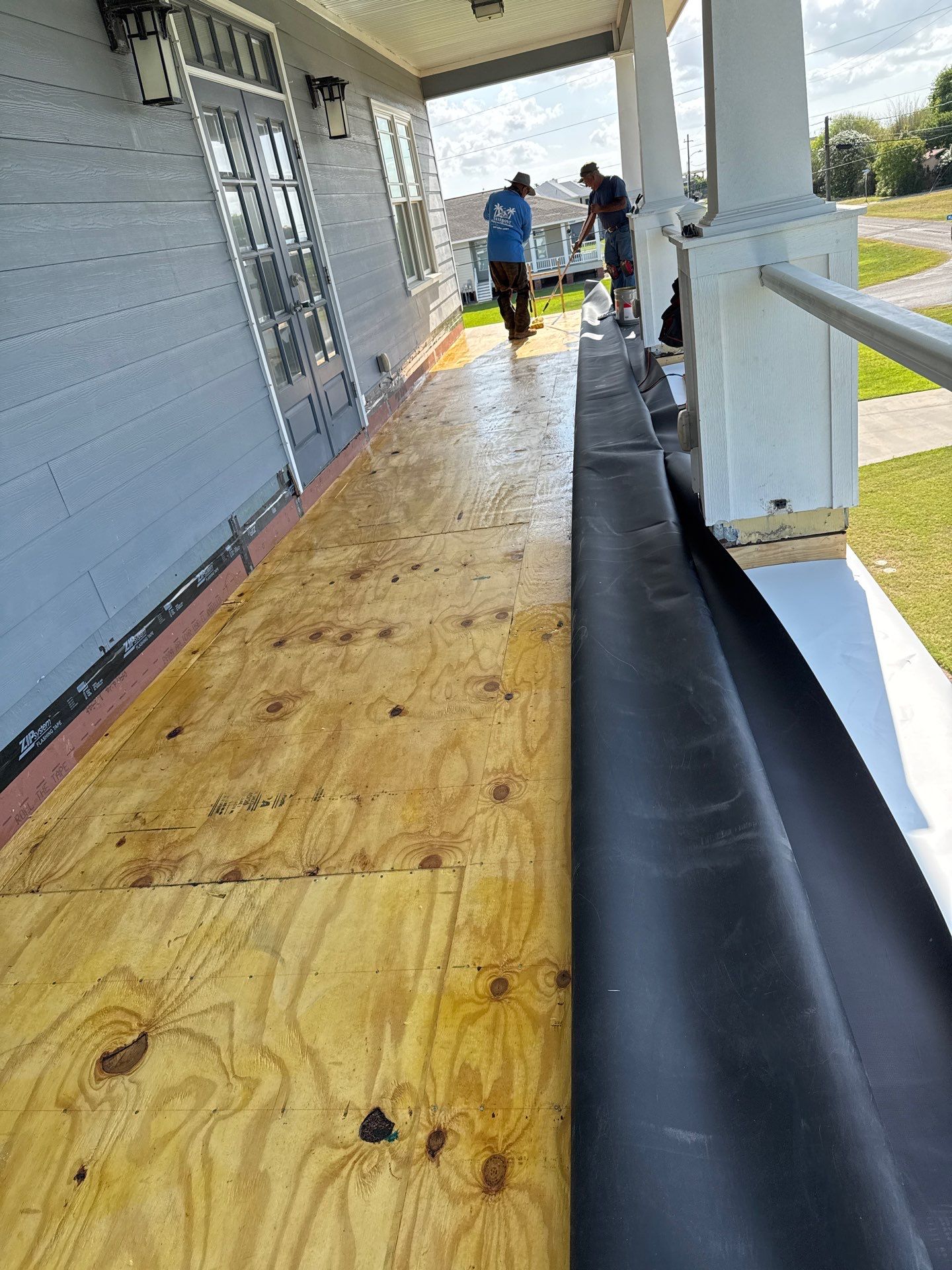 Walk Out Patio Cover by Bayfront Roofing and Construction
