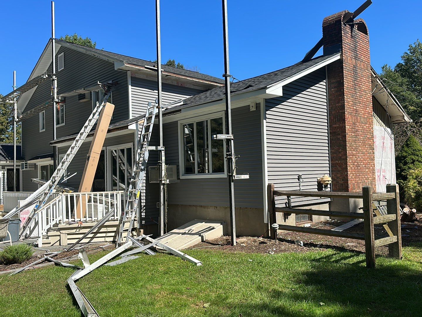 Residential Roofing Installation using Owens Corning TruDefinition Duration AR - Onyx Black & New Siding Using Mainstreet Charcoal Gray by A Plus Exterior