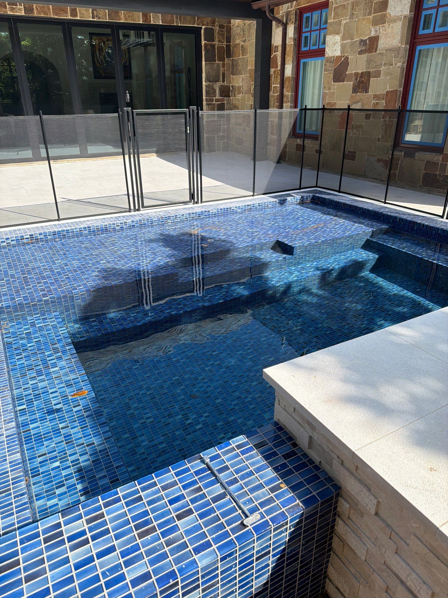 Geometric Pool with Raised Spa and Blue Tile by Pinnacle Pools and Spas - DFW