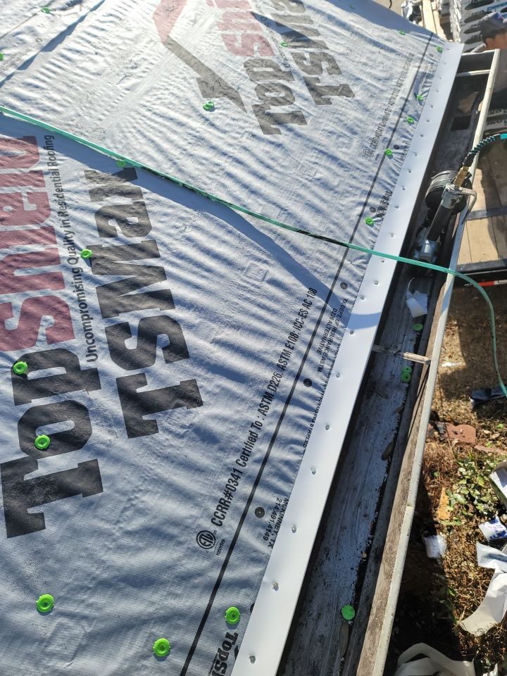 Residential Roofing Installation using Roof Replacement by American Roofing & Construction LLC