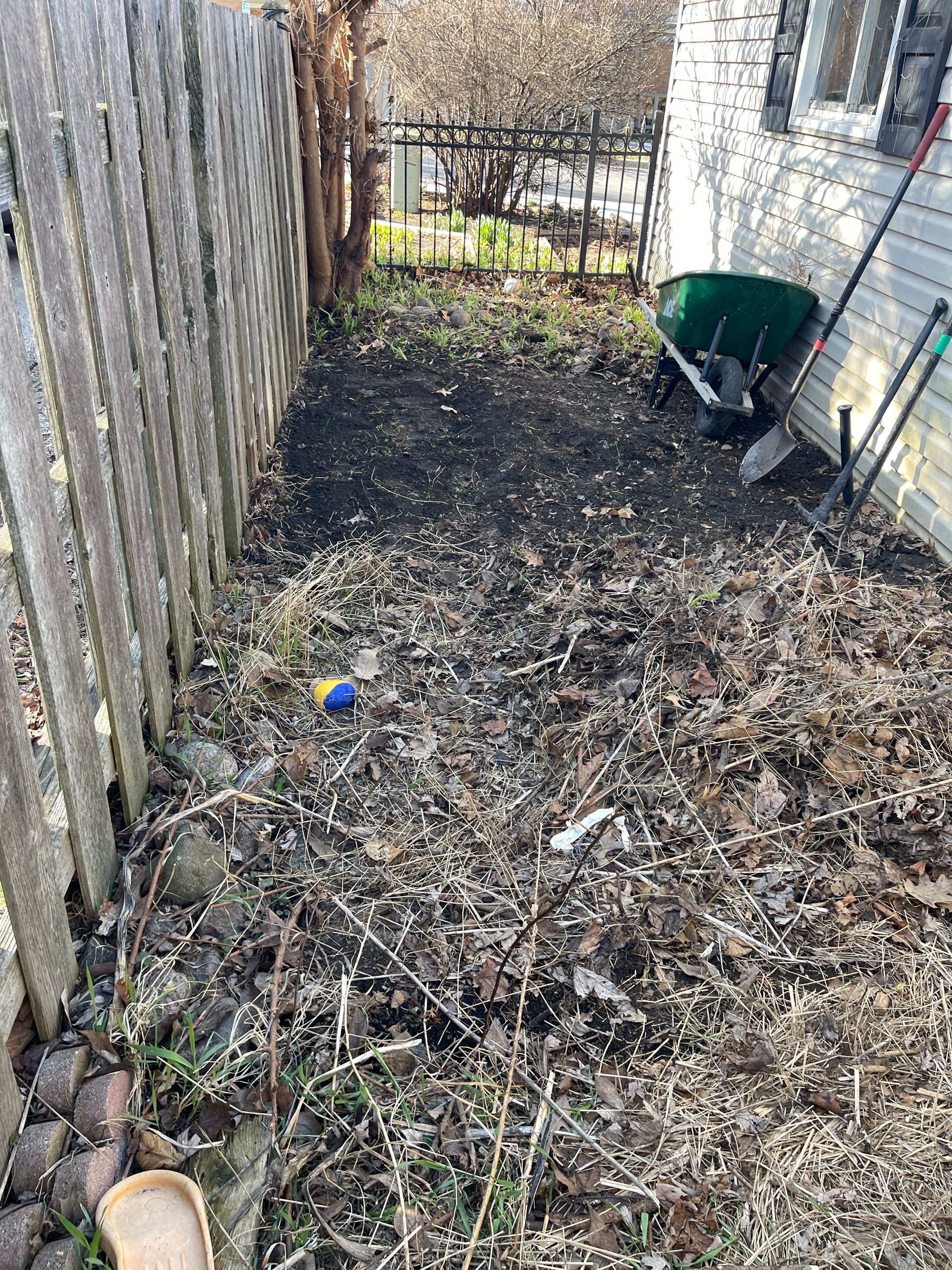 Rock Installation behind garage  by A&N 