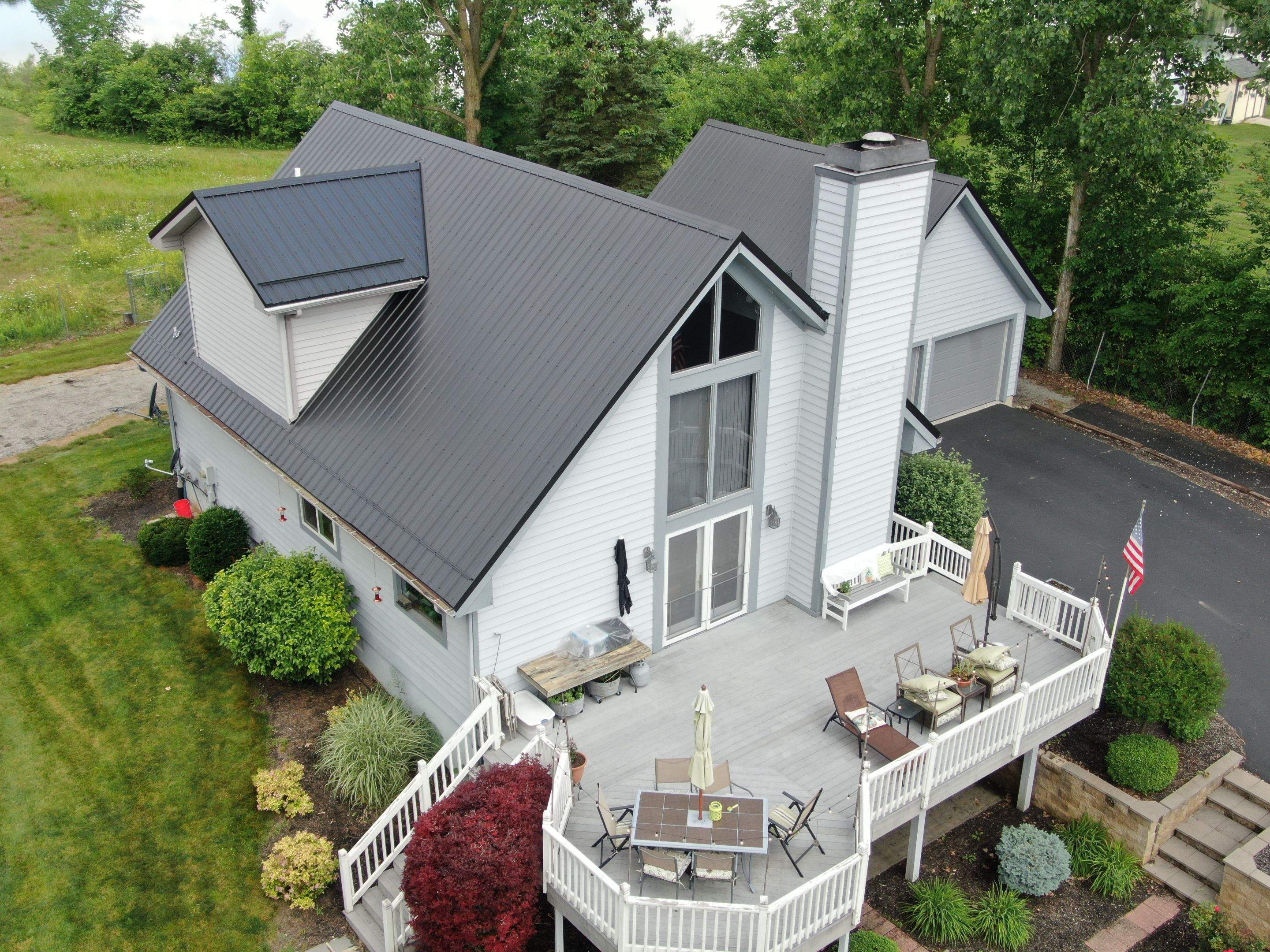 Residential Roofing Installation using Exposed Fastener Metal Roof by 4Ever Metal Roofing