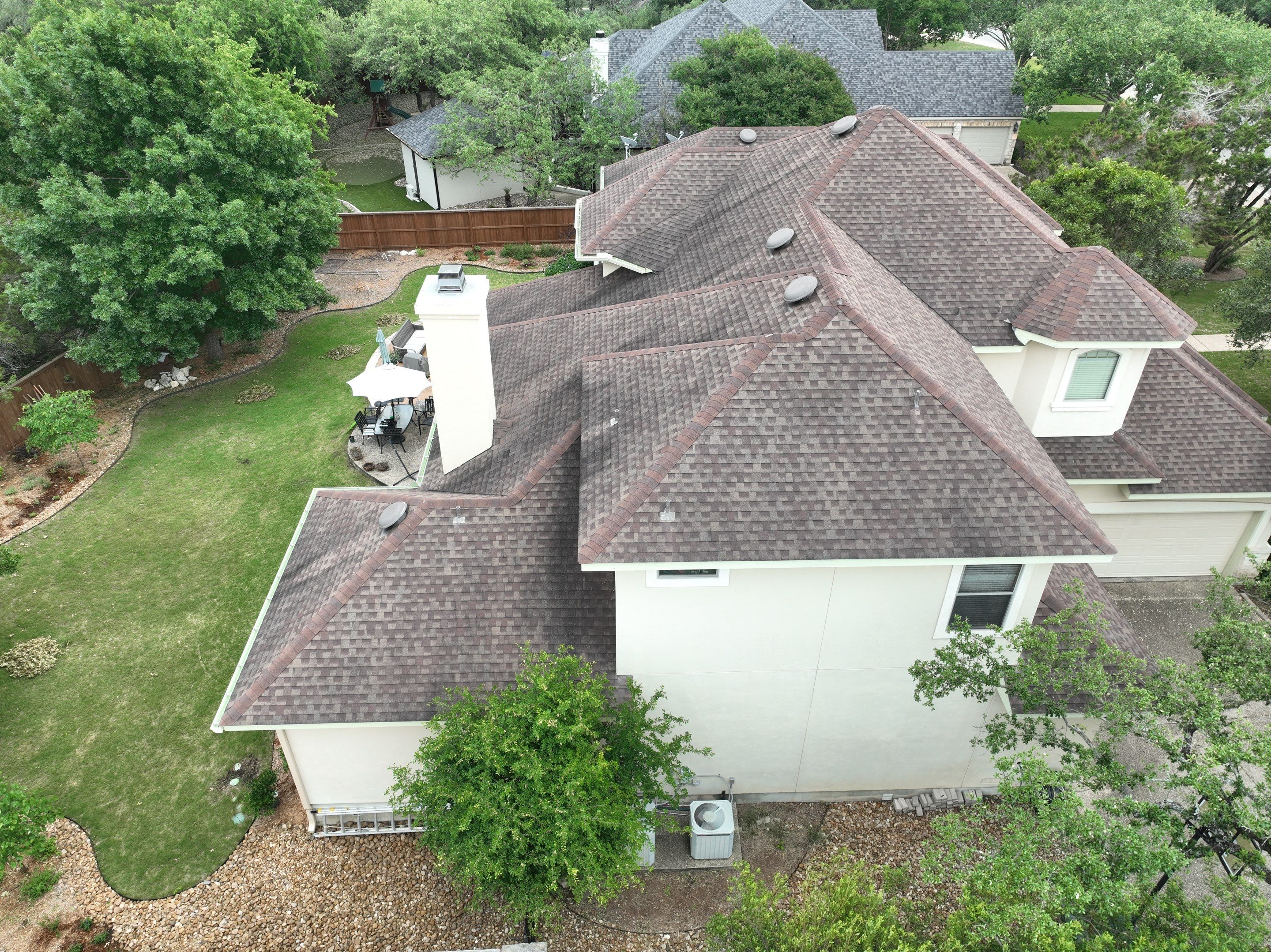 Residential Roof Replacement using 30 Year Laminate Shingles with High Profile Ridge by Premier Roofing and Contracting