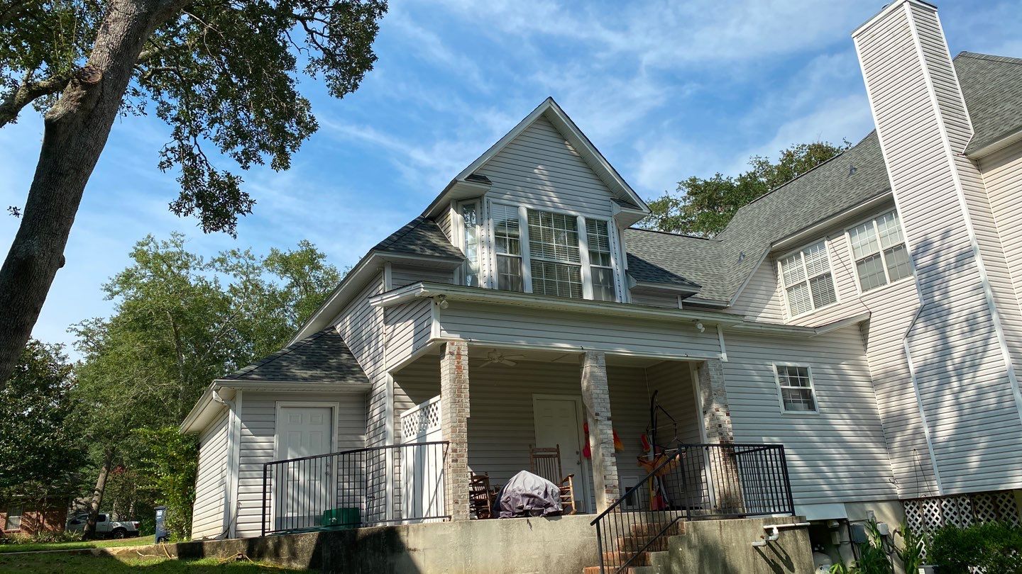 Residential Roofing Installation using Roof Replacement by American Roofing & Construction LLC