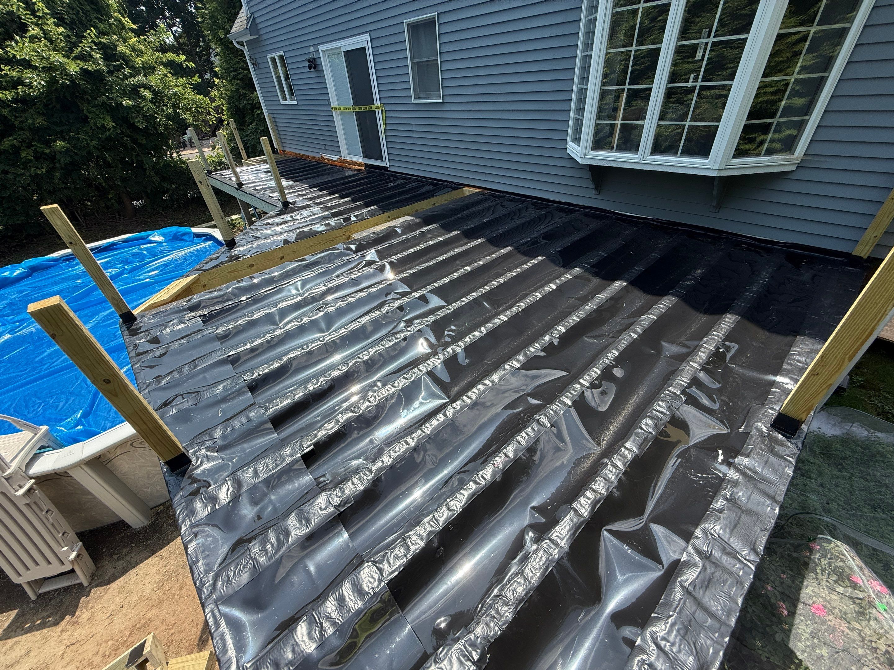 Complete replacement of original deck and addition of new pool deck by DiGiorgi Roofing and Siding Inc
