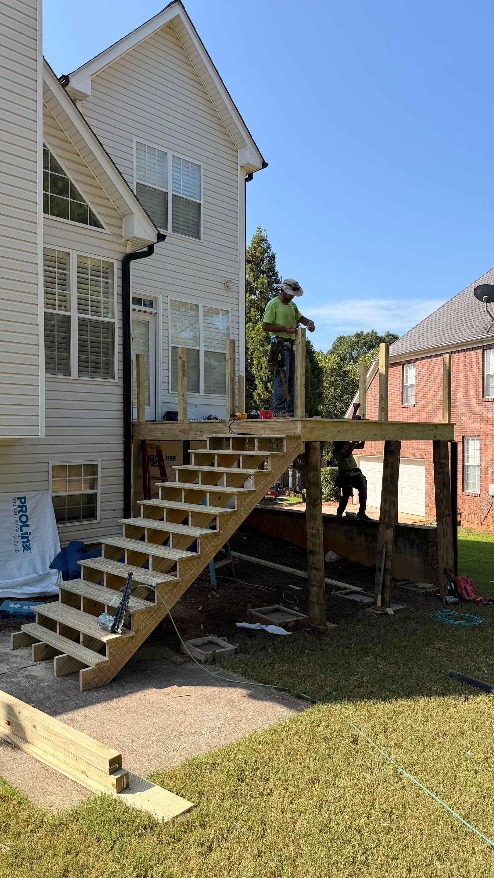 Elevated Pressure-Treated Deck and Staircase Rebuild in Douglasville by Swift Home Renovations