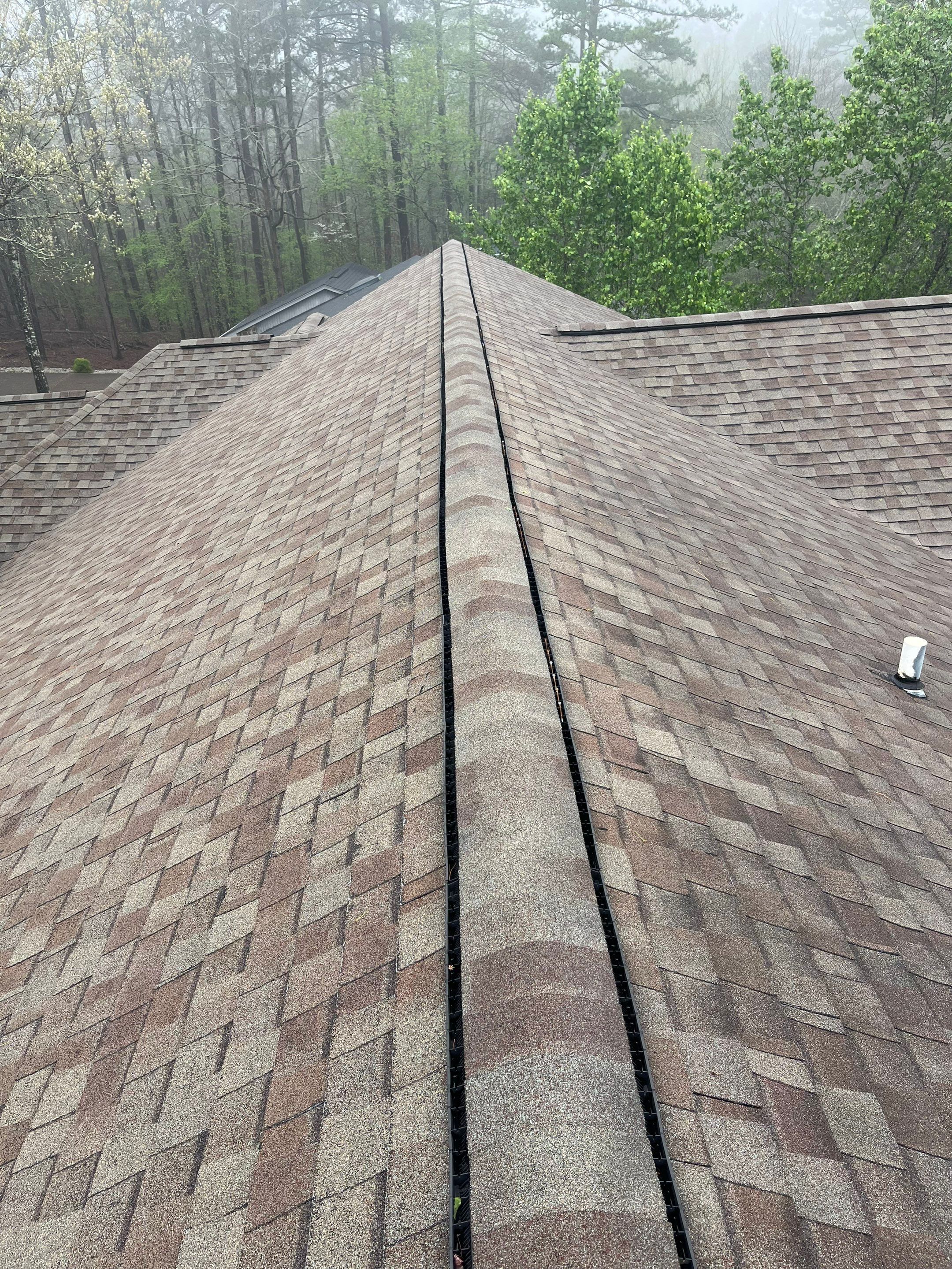 Architectural Shingle Roof Replacement and Skylight Installation in Hot Springs Village by Temple Roofing and Exteriors
