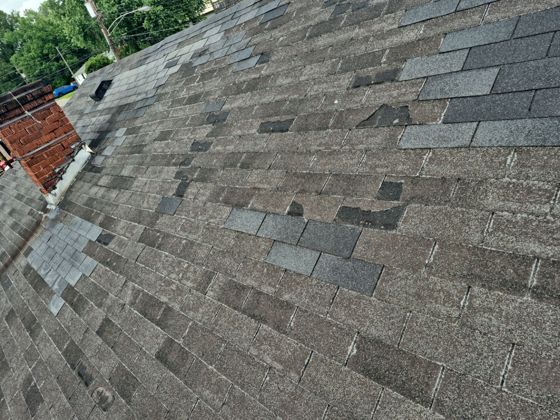 Matte Black Elegance: IKO Dynasty Roof Transformation in Ashland, KY by Mr. Roofer