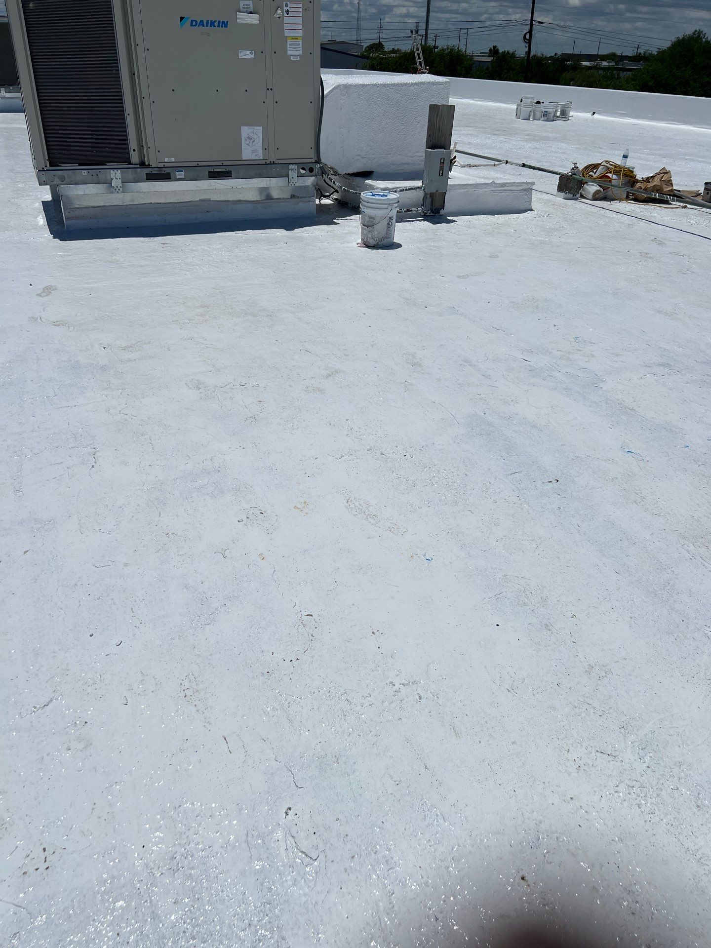 Dirty leaking Gravel Roof by Bayfront Roofing and Construction