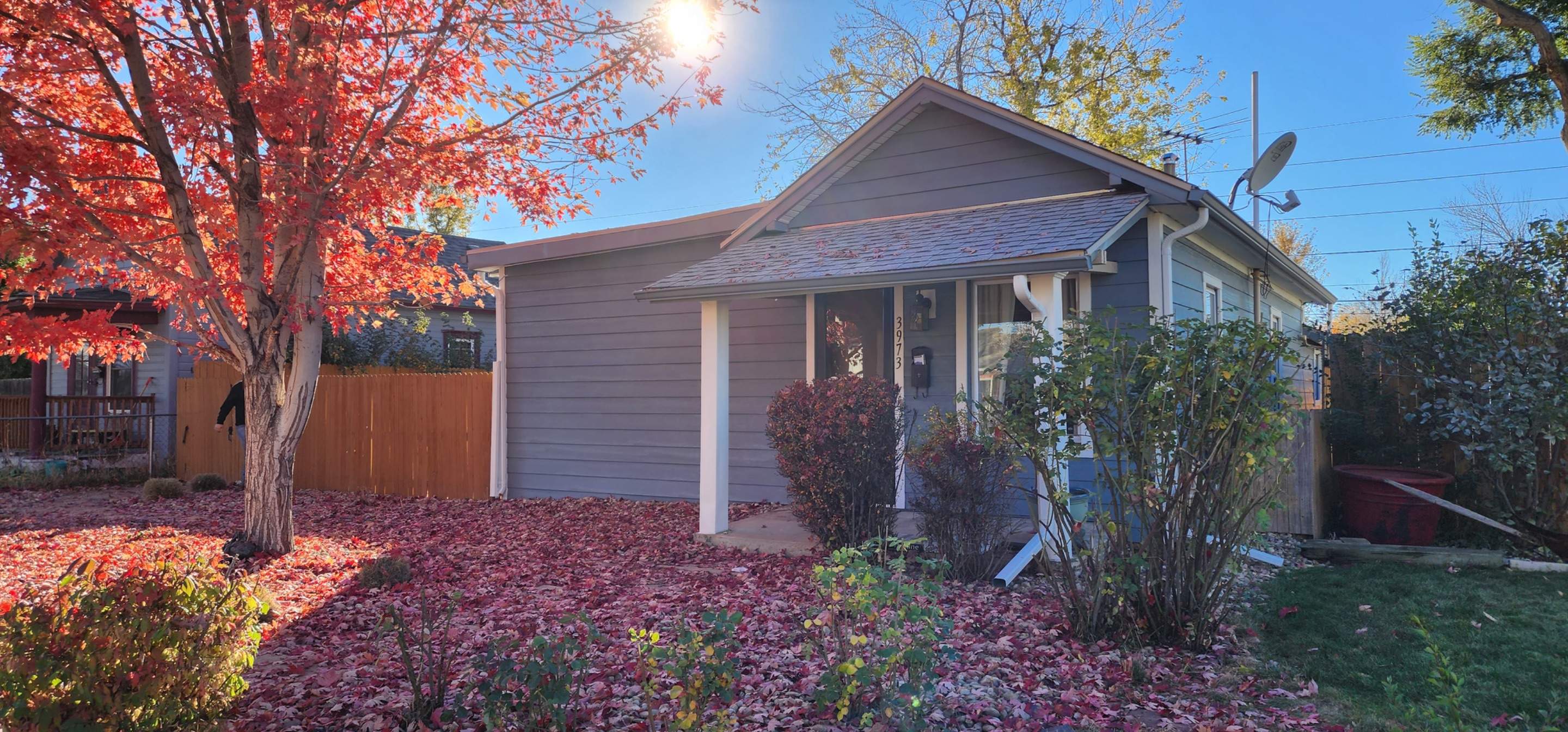 Beautiful little home in Denver receiving Lp Smartside Siding by 1st choice windows and siding