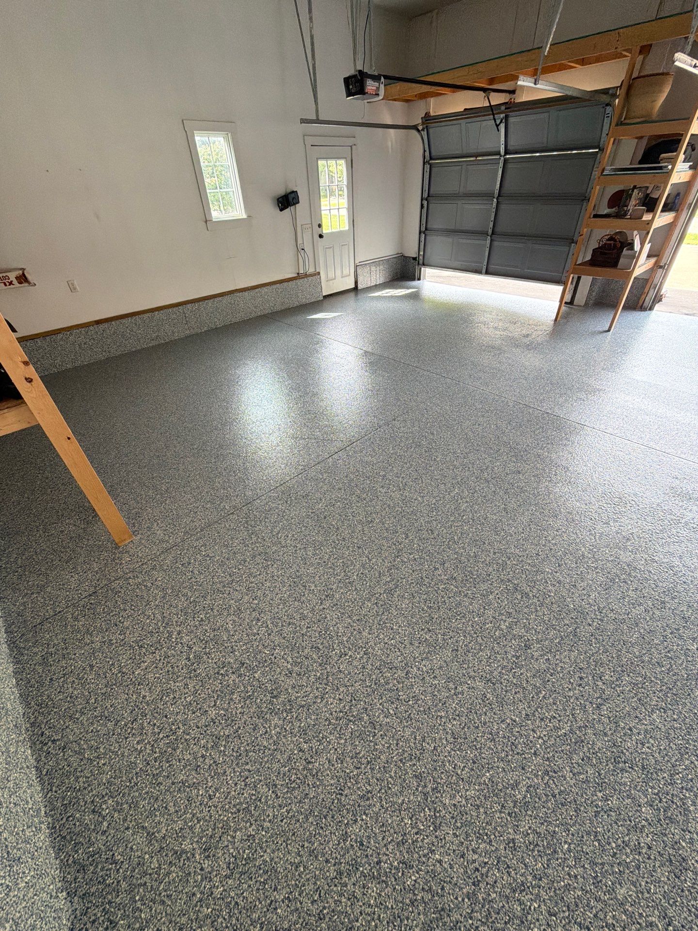 Custom Tidal Wave Epoxy Flake Floor Installation in Norton Shores. by Gordon Painting
