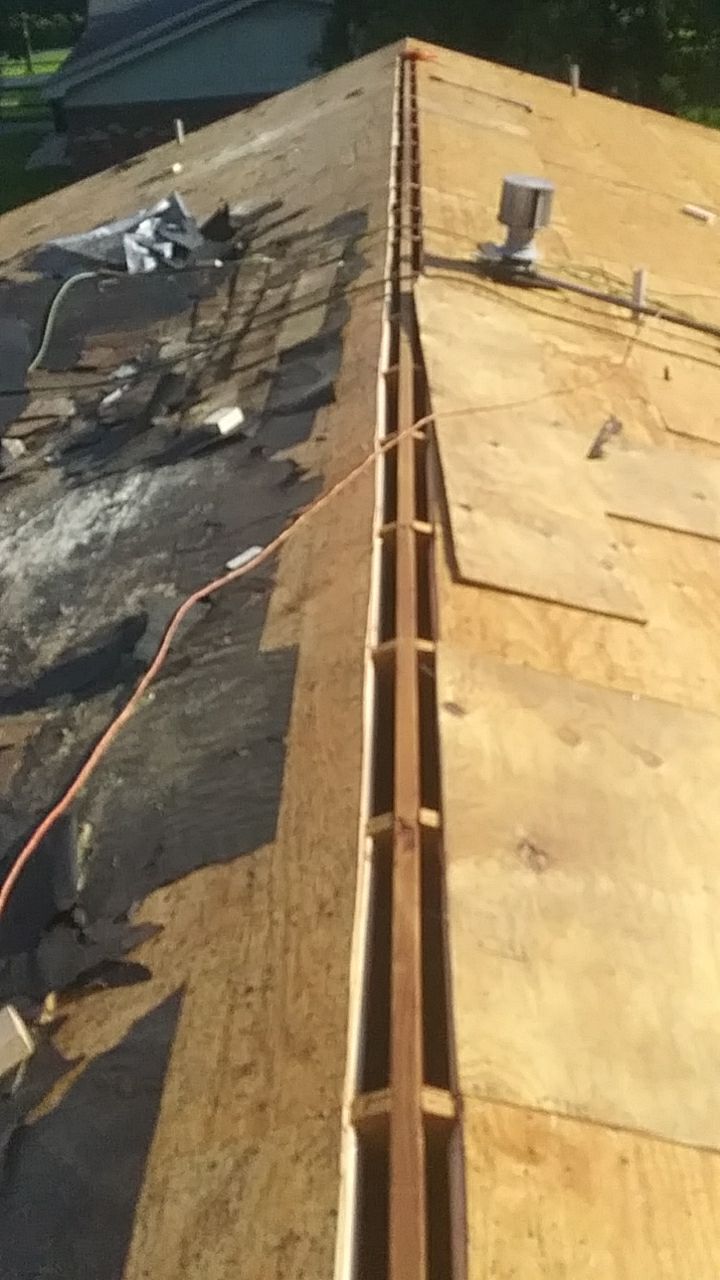 Residential Roofing Installation using Roof Replacement by American Roofing & Construction LLC