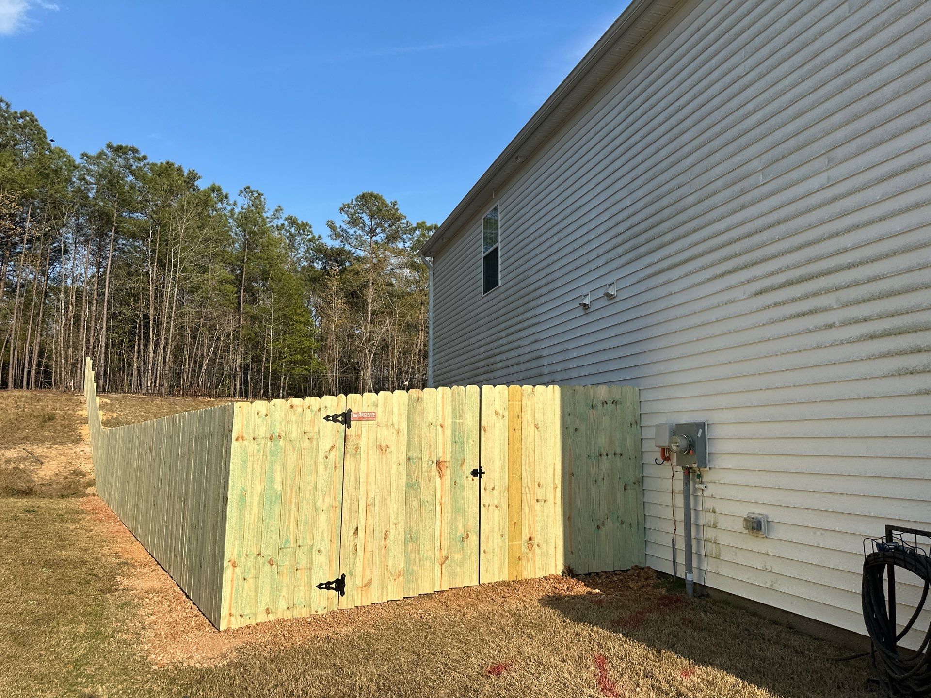 Wood Privacy Fence Installation in Carthage, NC by Superior Fence and Rail
