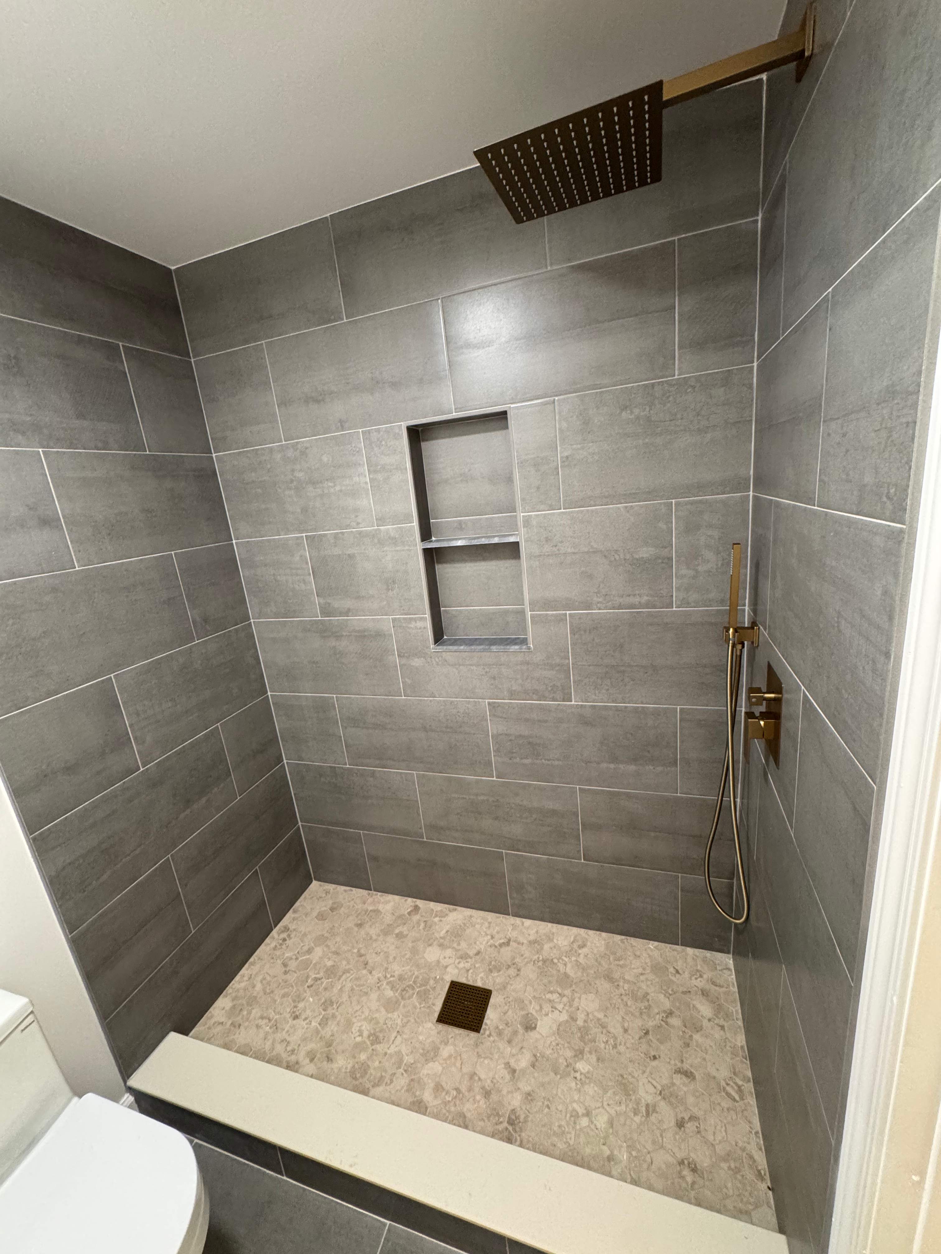 Jack and Jill bathroom renovation by Prudencio