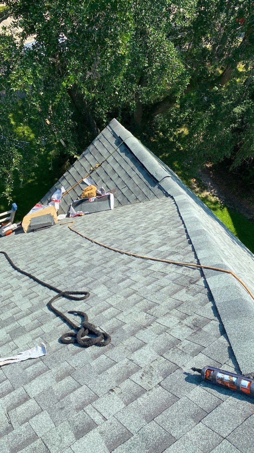 Residential Roofing Installation using Roof Replacement by American Roofing & Construction LLC