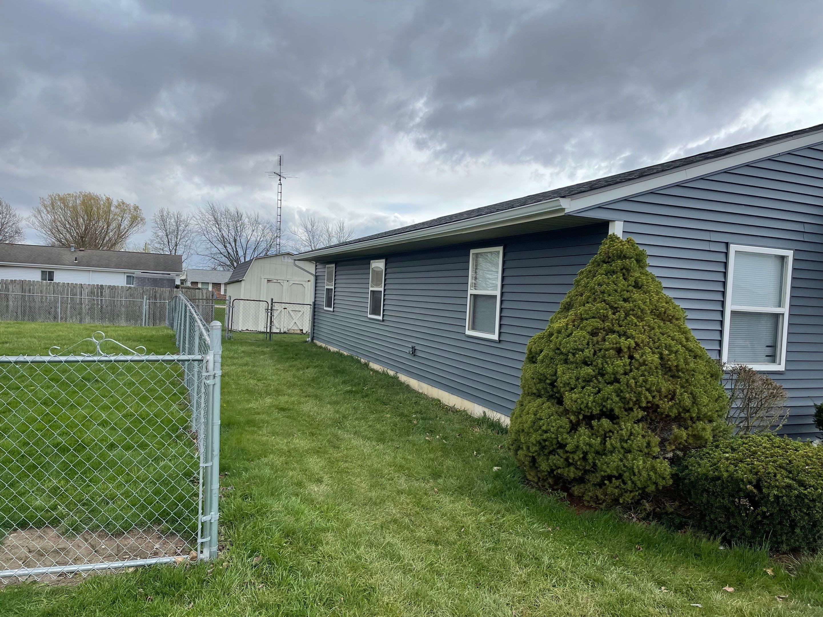 Storm Damage Residential Roof and Siding Installation by WIW Enterprises Inc