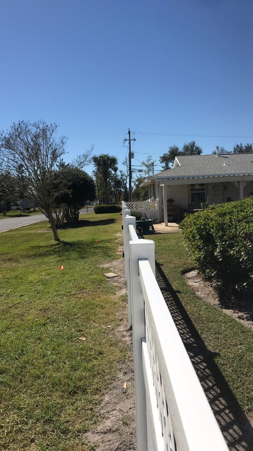 Fence Installation using White Vinyl by Hip Square Fence Inc.