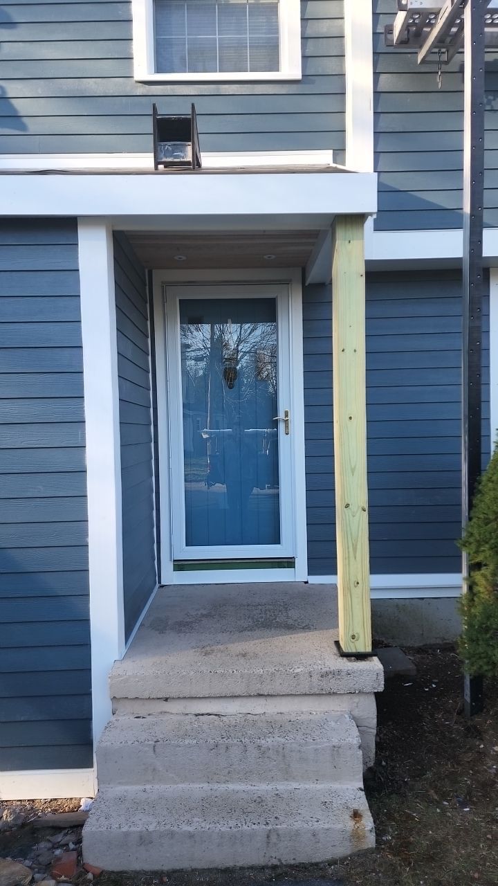 James Hardie siding, new metal roof and couple windows being installed. by UBrothers Construction