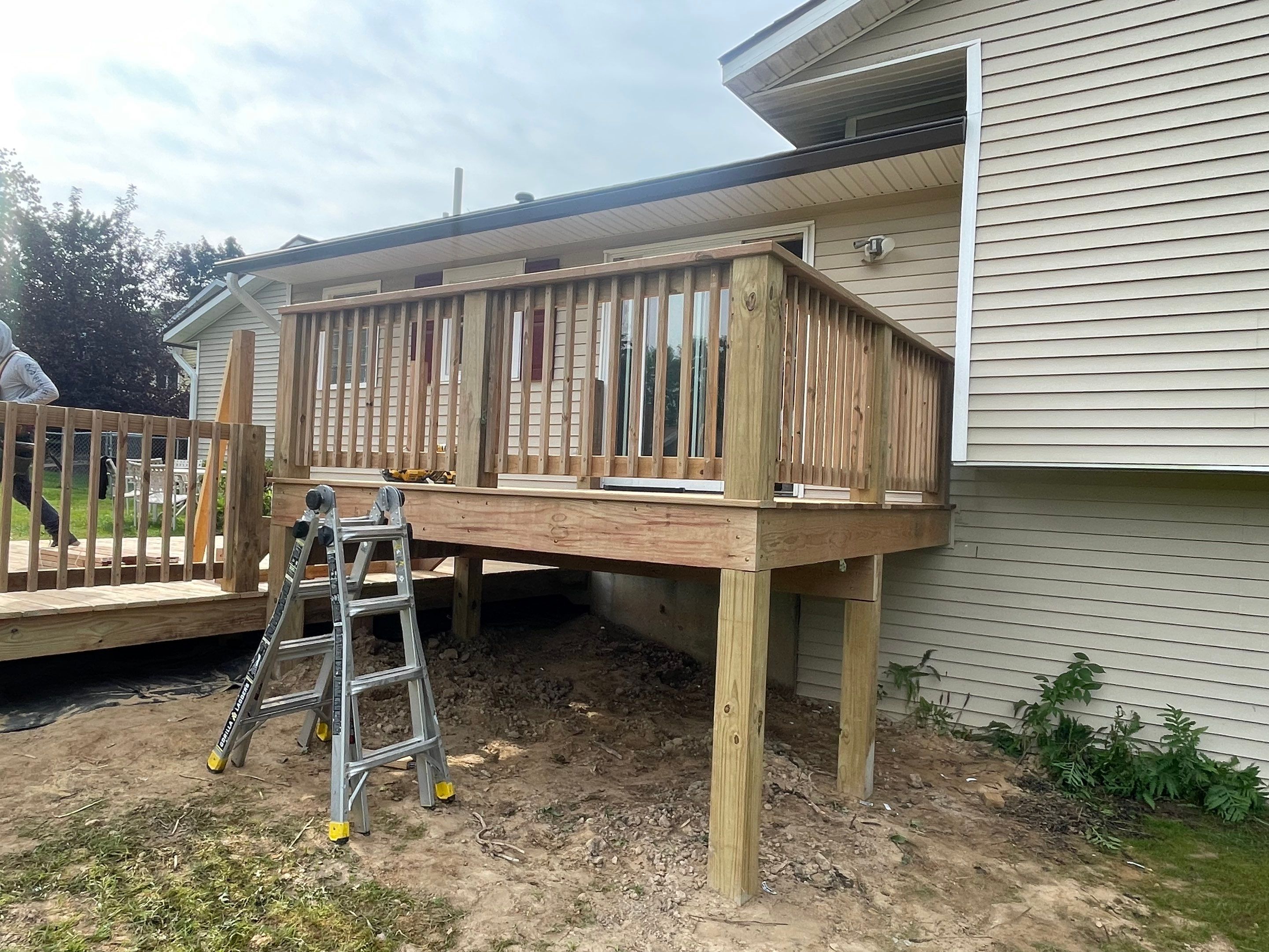 Deck Installation using Treated Lumber by Avalon Roofing and Exteriors