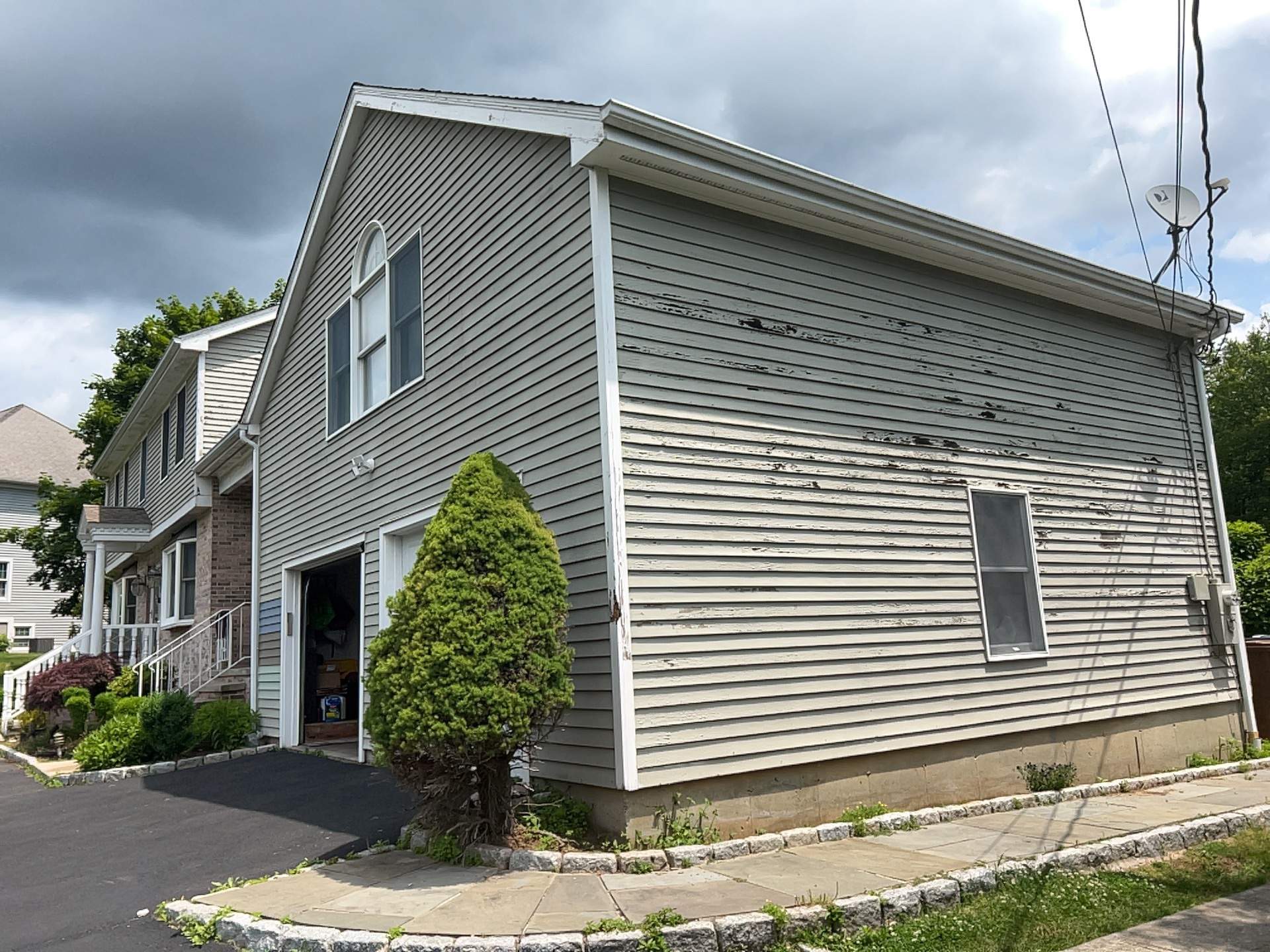 Siding Installation using Mainstreet Colonial & White gutters by A Plus Exterior
