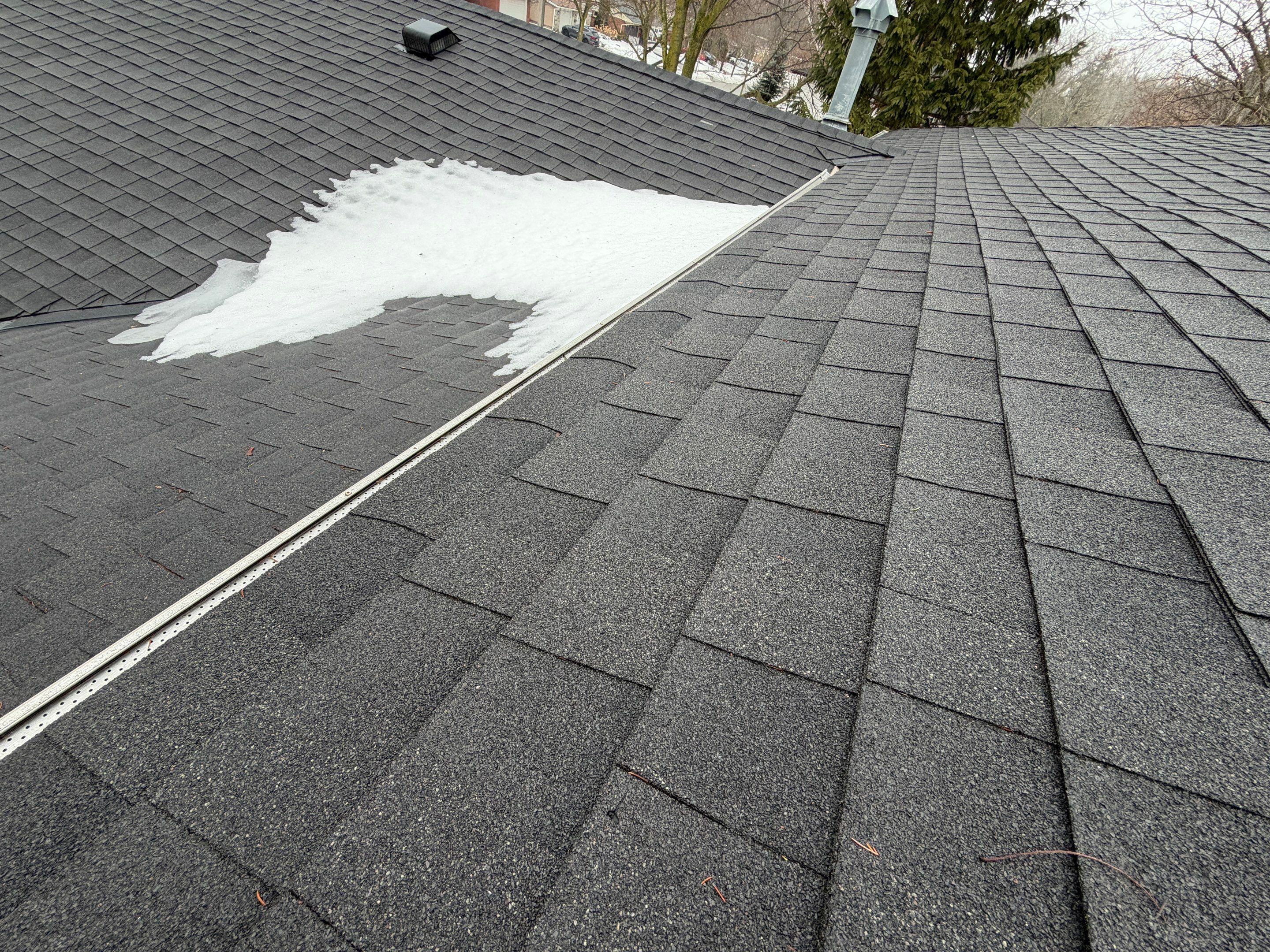 Project in Burlington by The Roofing Crew