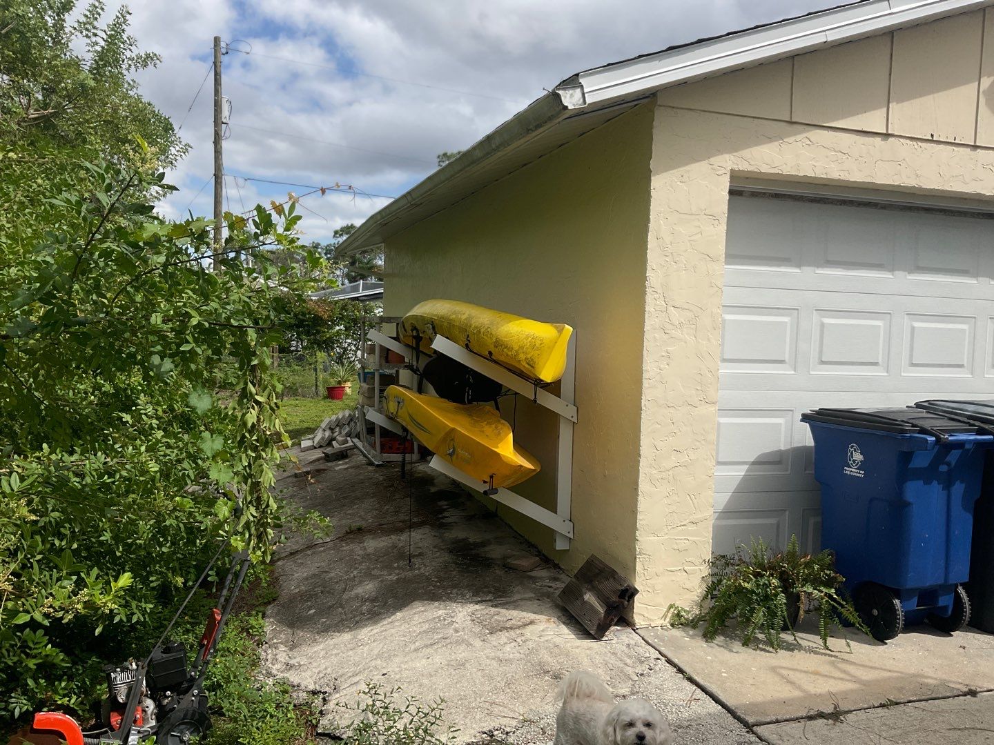 3x4 Downspouts and Seamless Gutters for Coastal Homes in St James City FL by Gutter Professors