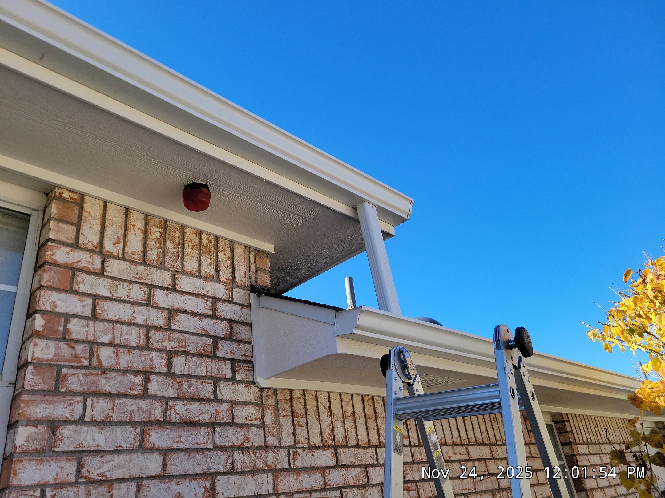 Seamless White Gutter and Downspout Installation in Albuquerque by Doyle Roof Masters Inc