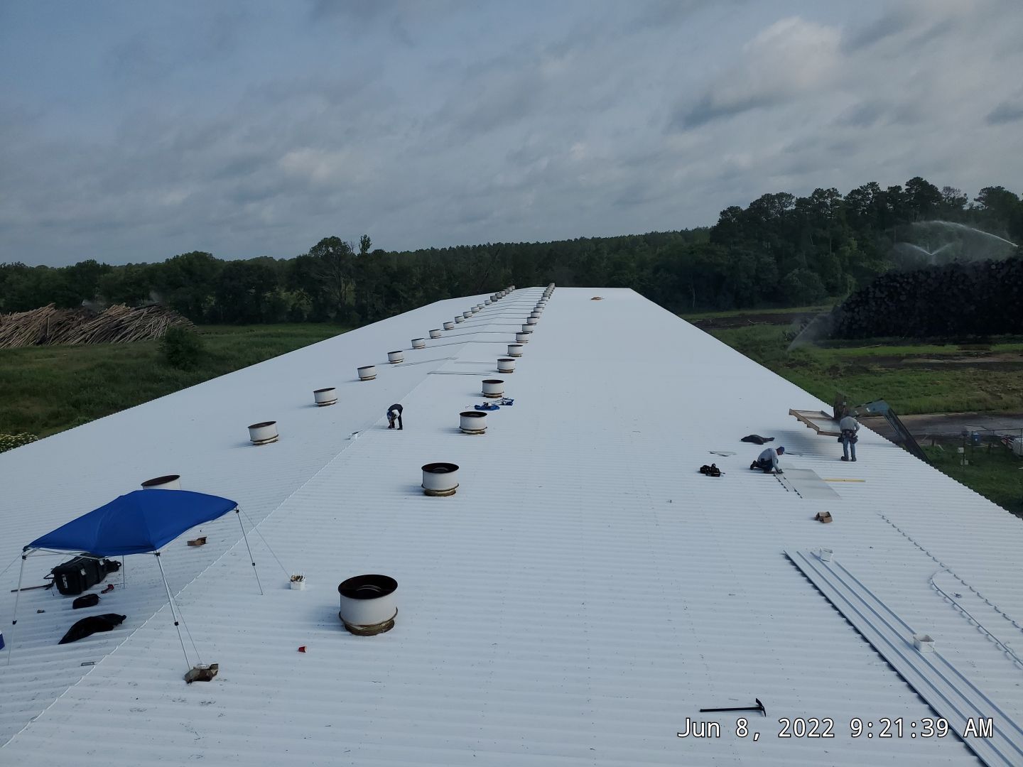 Commercial Roofing Installation using Aluminum Roofing panels by Hostetler Roofing
