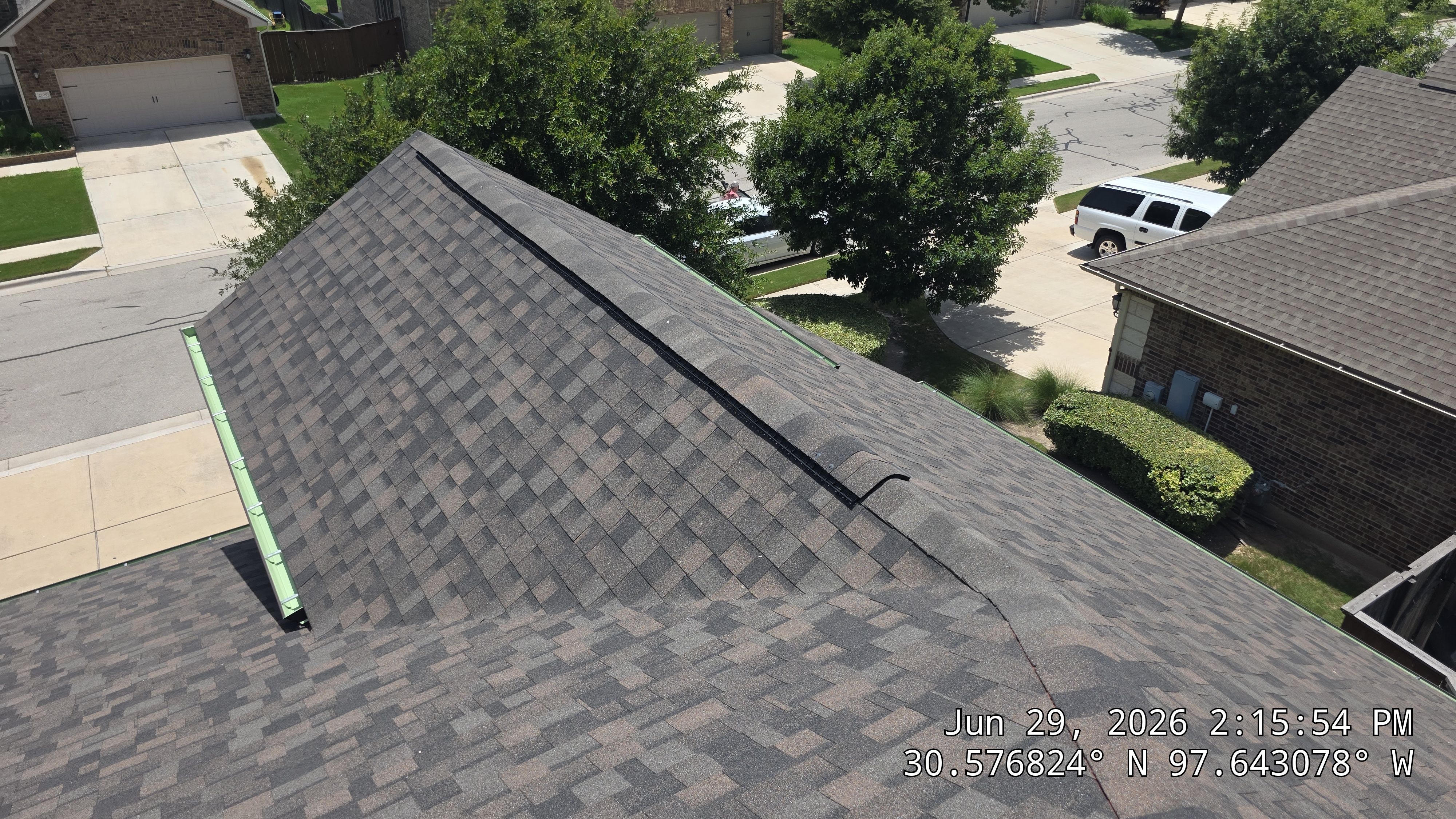 Architectural Shingle Roof Replacement and Hail Damage Restoration in Round Rock by Caliber Restoration LLC