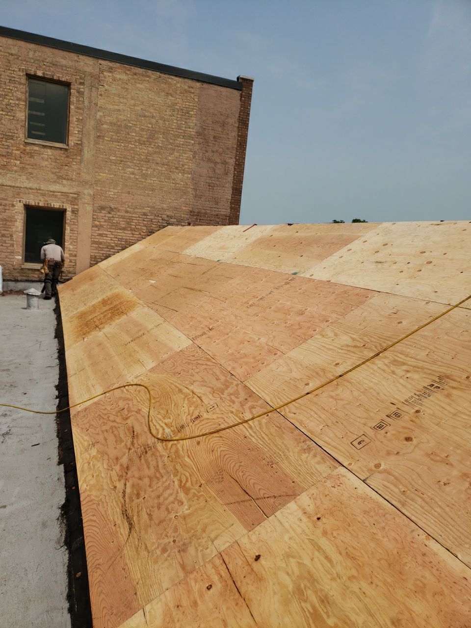 Asphalt Roof Replacement with Aluminum Gutter Installation by Custom Installations