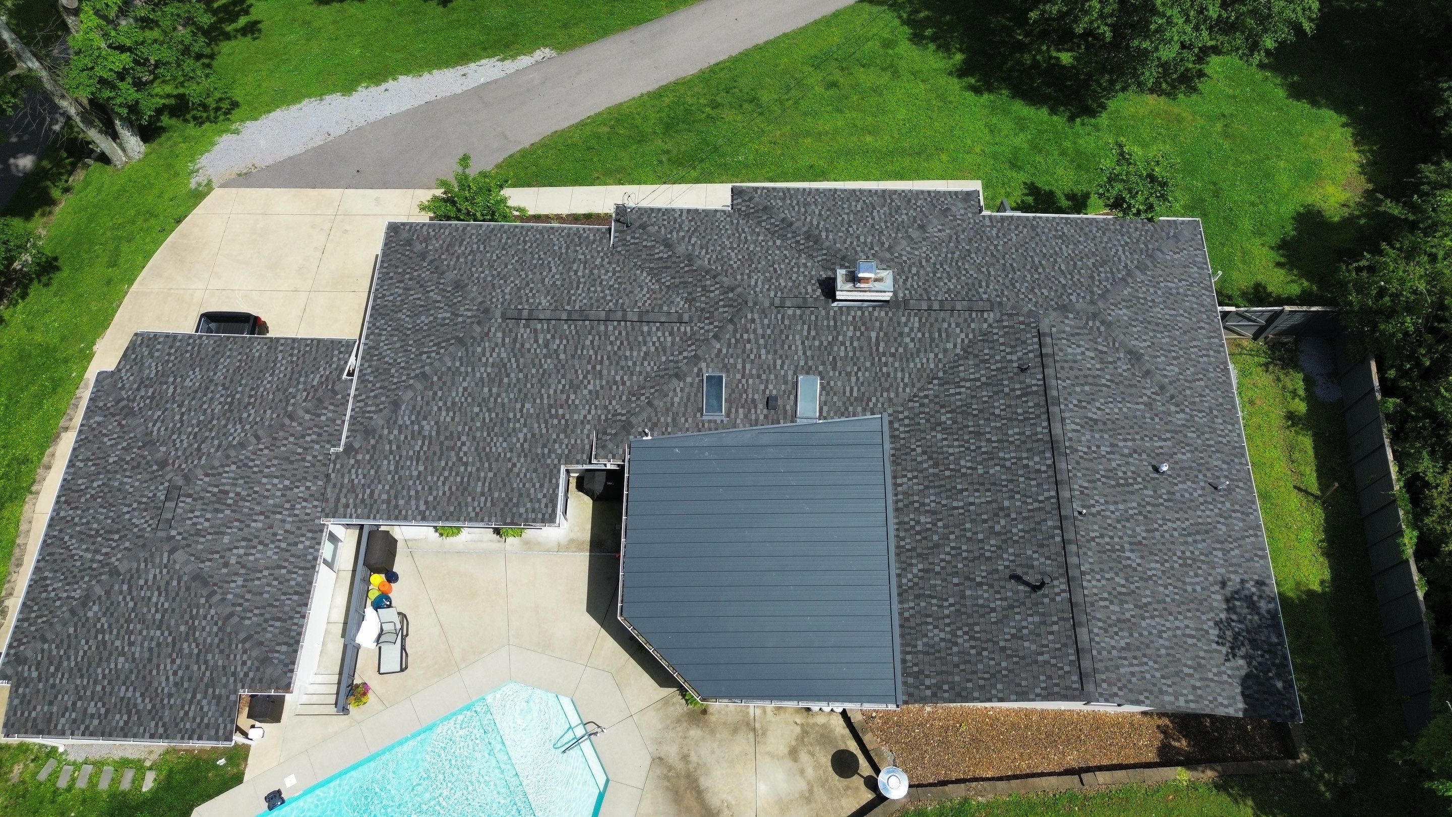 Residential Roofing Installation using GAF Timberline HDZ and Standing Seam Metal by Undersun Roofing 