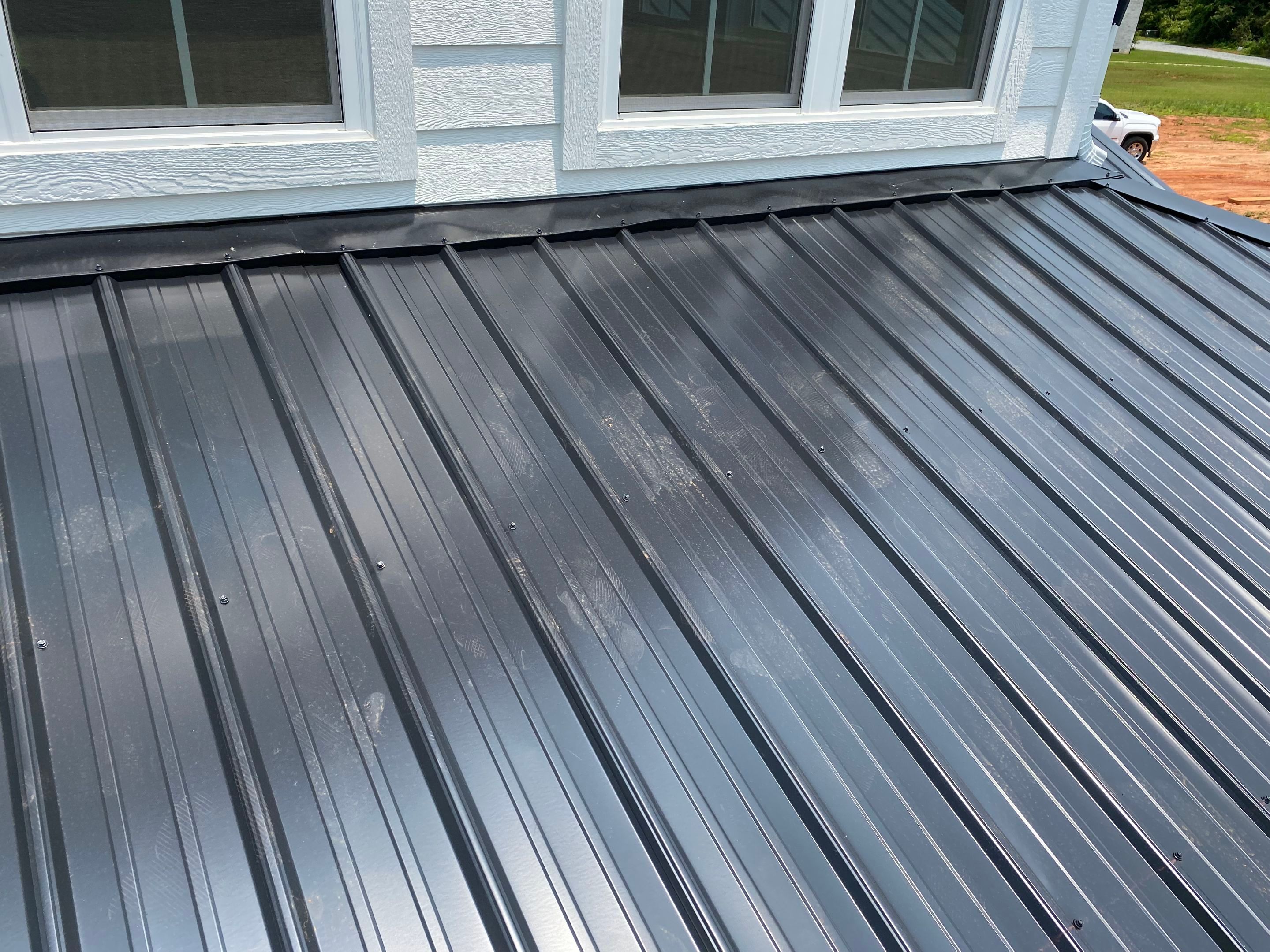 Jason's metal porch roof by BROCK BUILDERS 