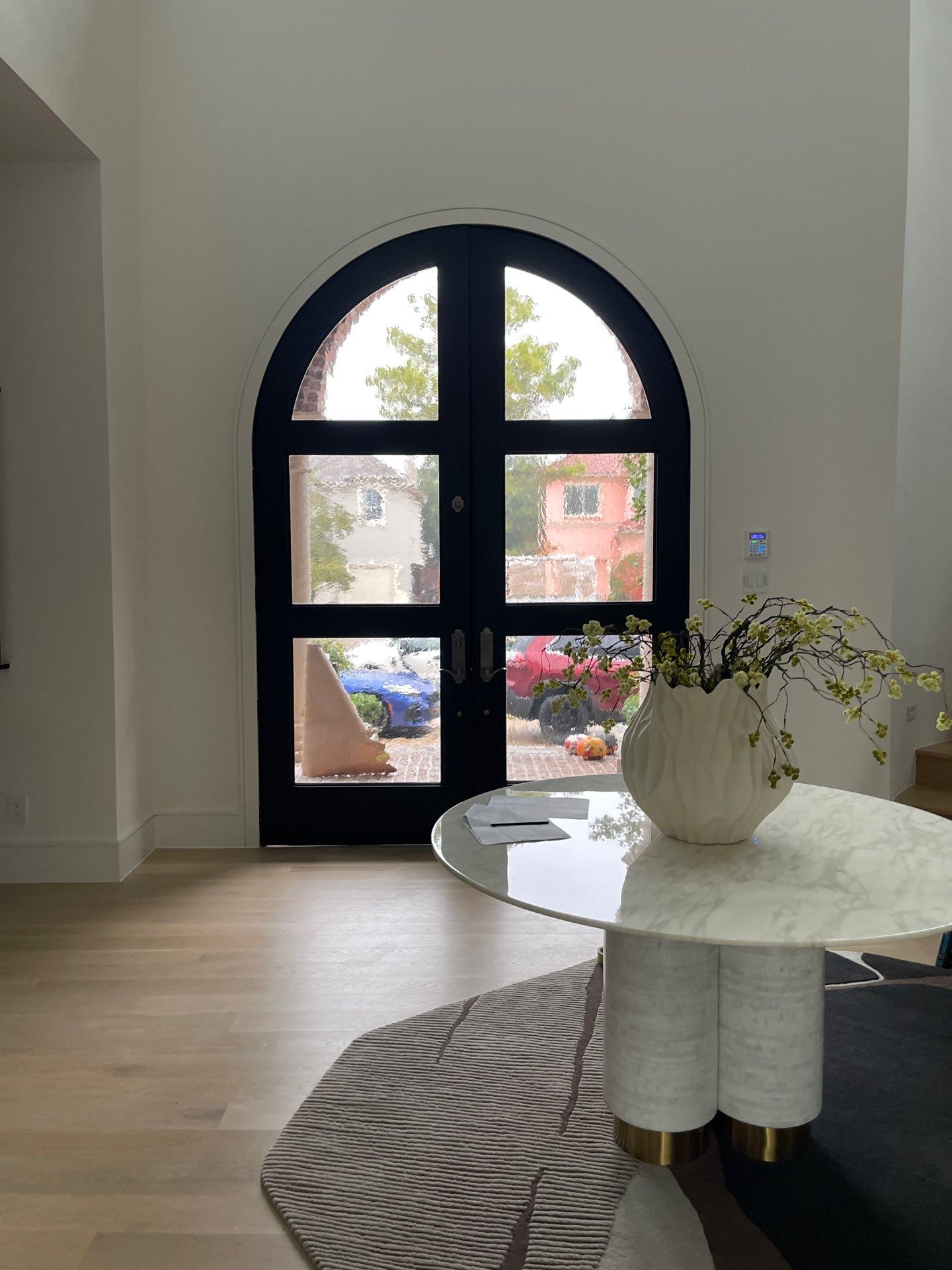 Custom Arched Metal Entry Door Installation in Plano by Solara Custom Living