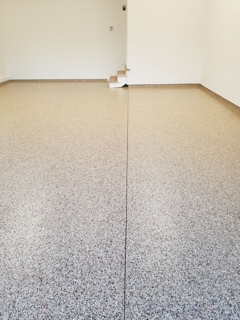 Garage Floor in Sandstone by Spectrum Painting, LLC