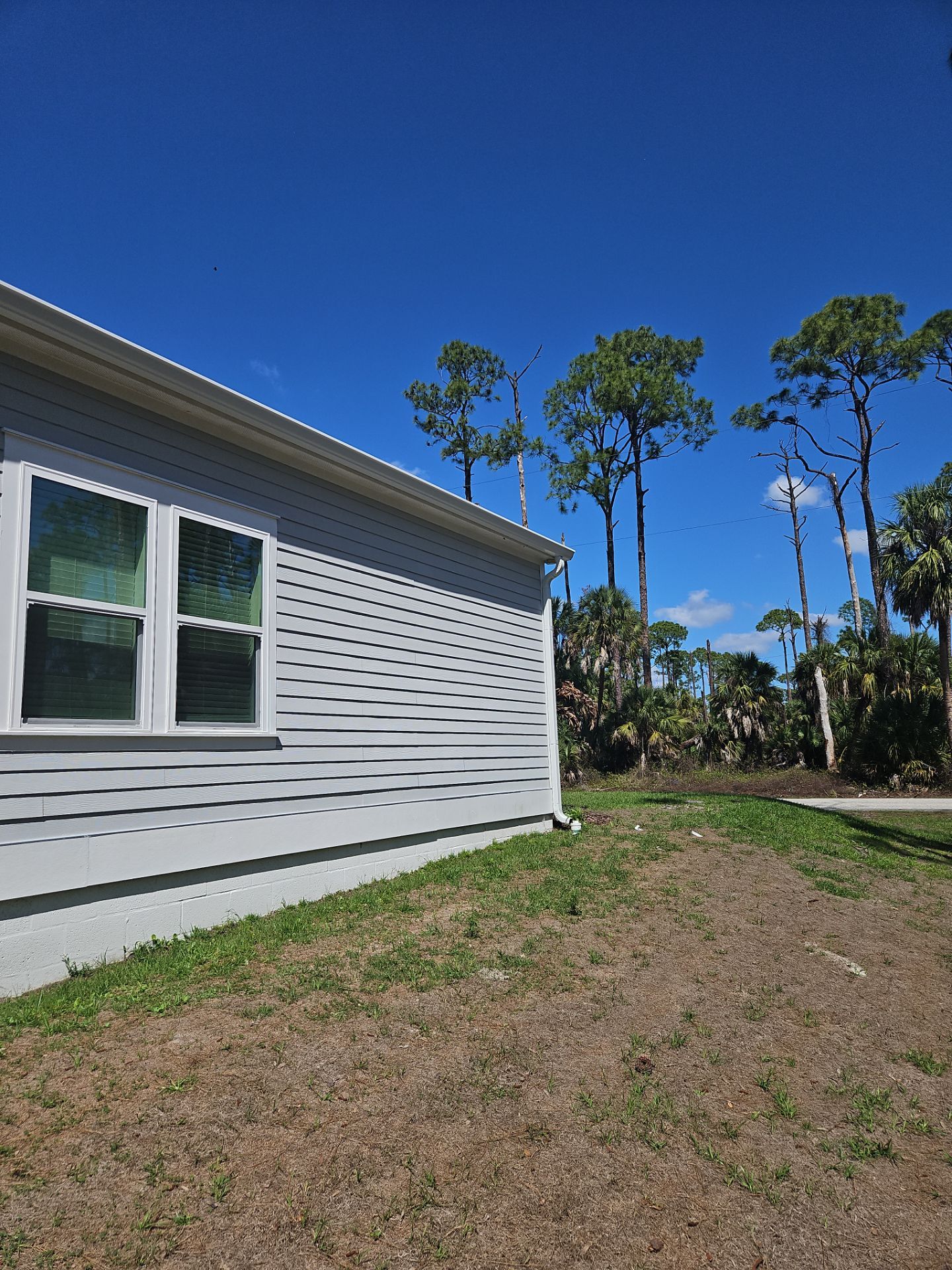 Downspout Installation using 3X4 Elbow Downspout in Port Charlotte FL by Gutter Professors