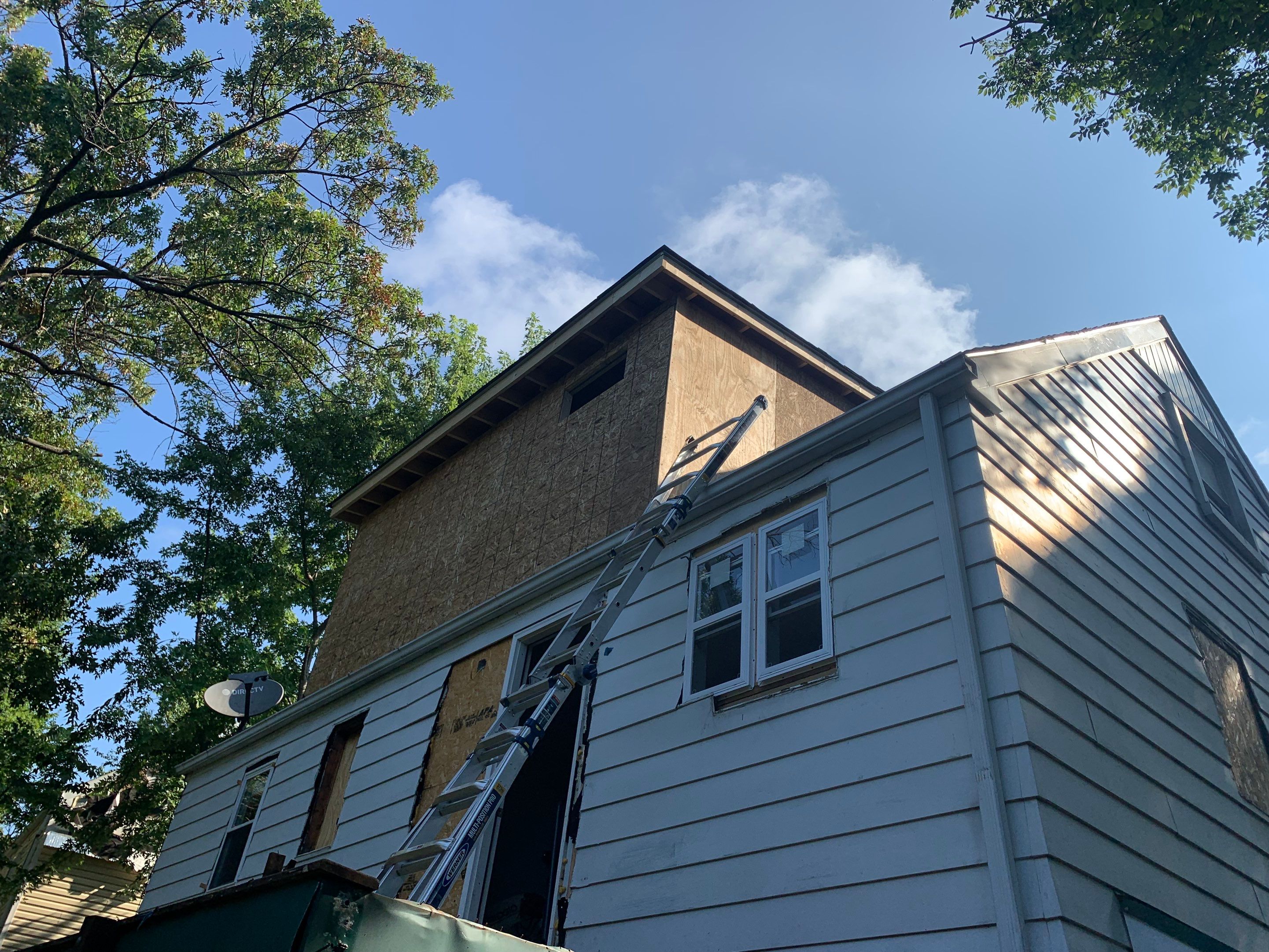 Room addition on the second floor of house by Greenspring Construction Services