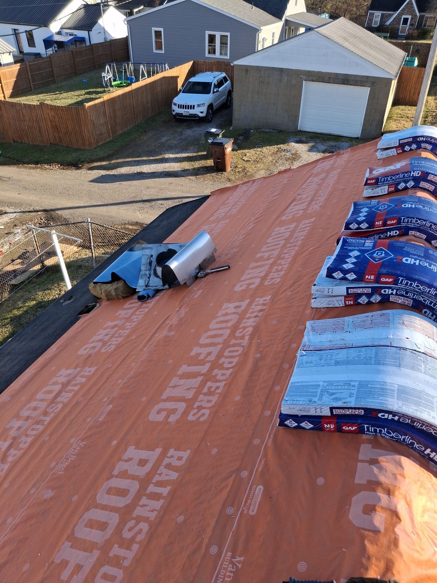 Residential Roofing Installation using GAF TImberline HDZ Hickory by Rainstoppers Roofing
