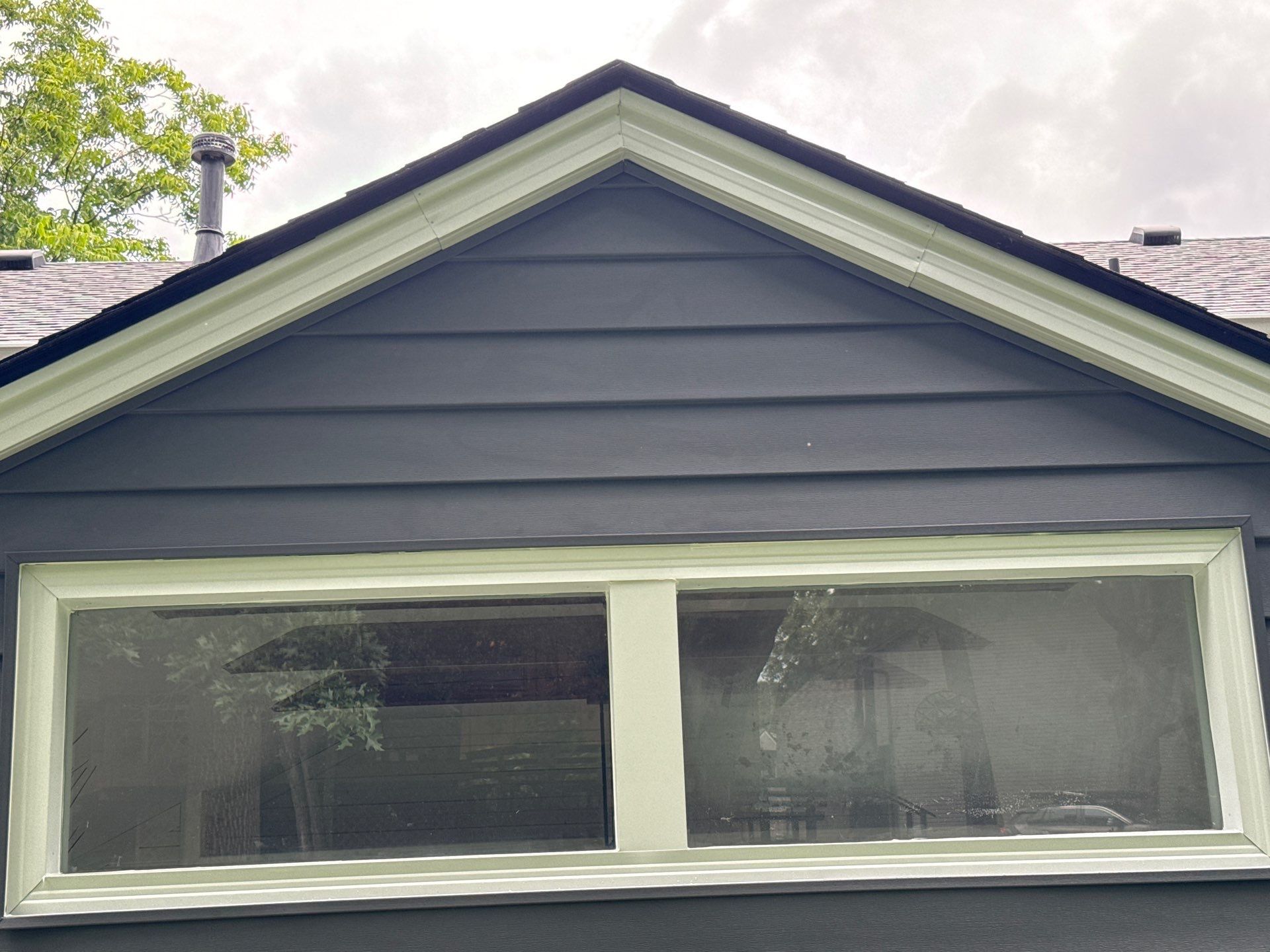 Full Exterior Siding Upgrade and Board and Batten Installation in Shawnee by EEC Windows, Siding & Roofing